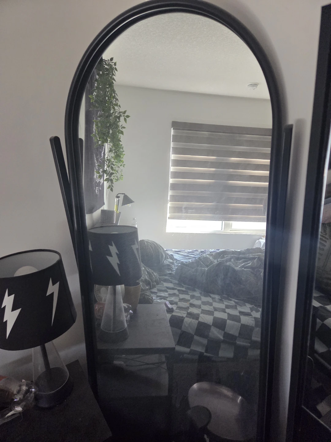 Black arched floor mirror