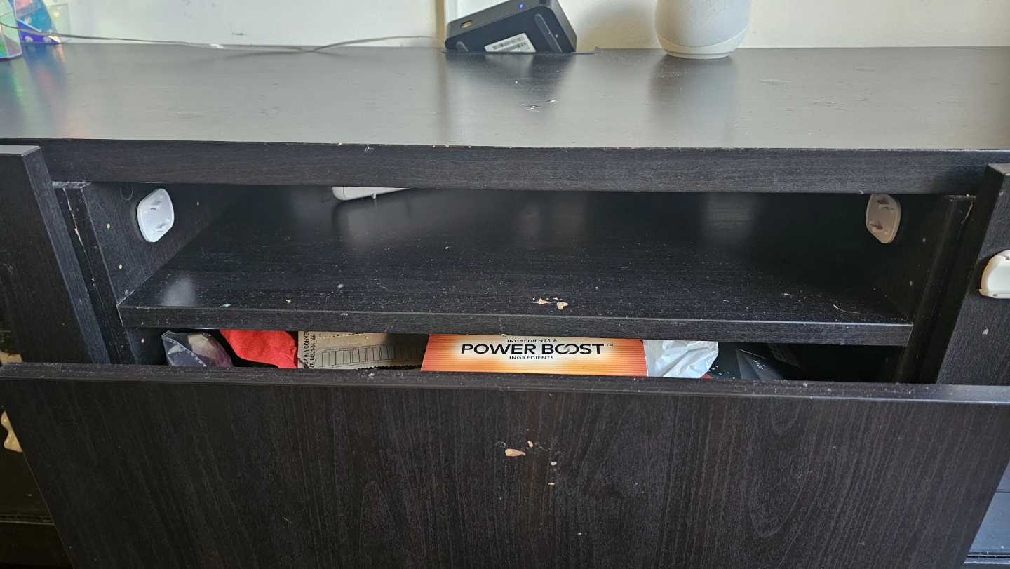 Black TV media stand with glass doors