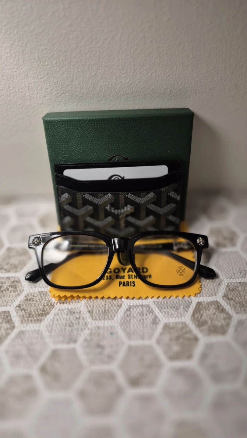 Goyard card holder and chrome glasses