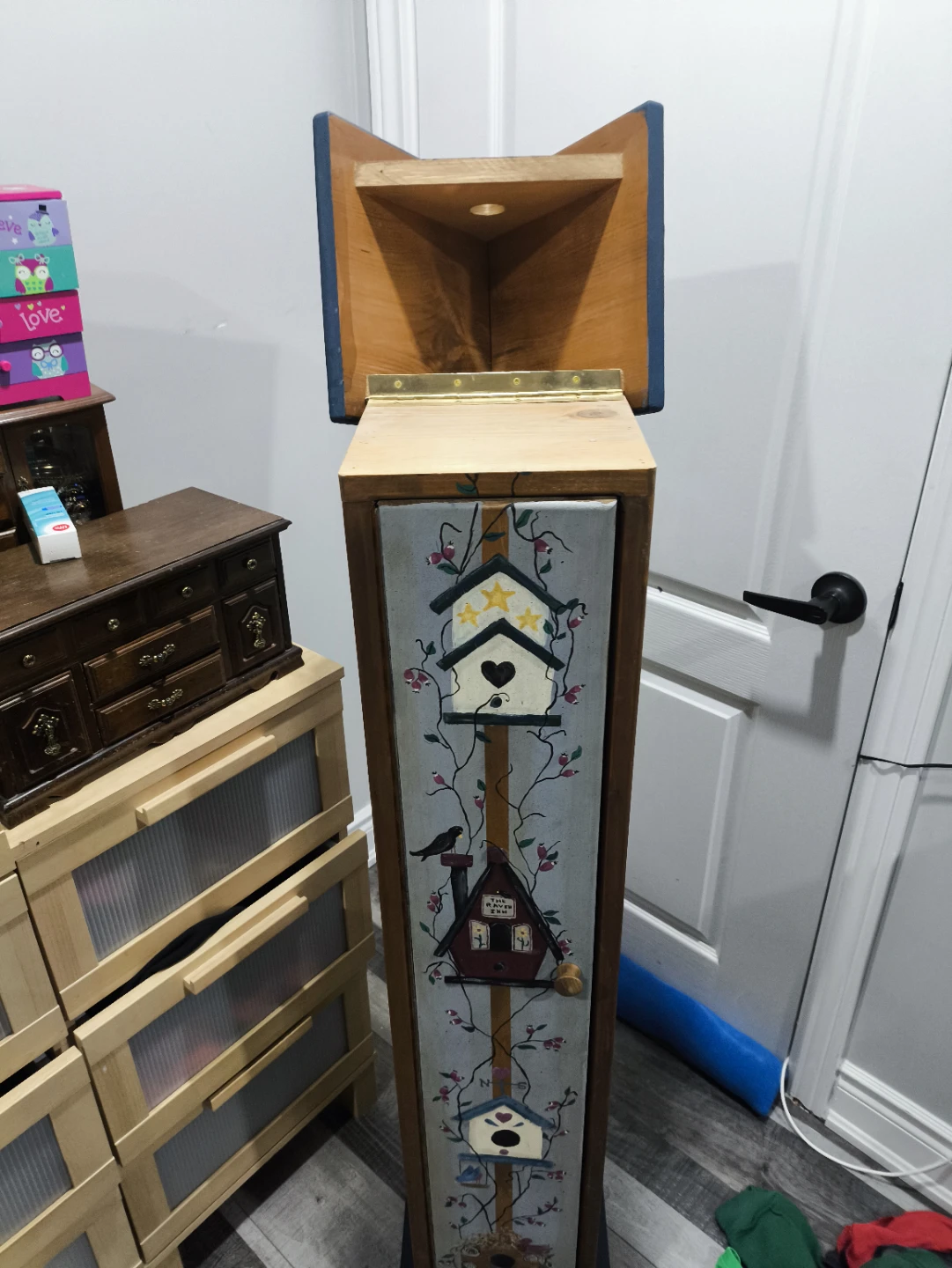 Tall Wooden Storage Cabinet with Decorative Birdhouse Design - photo 2