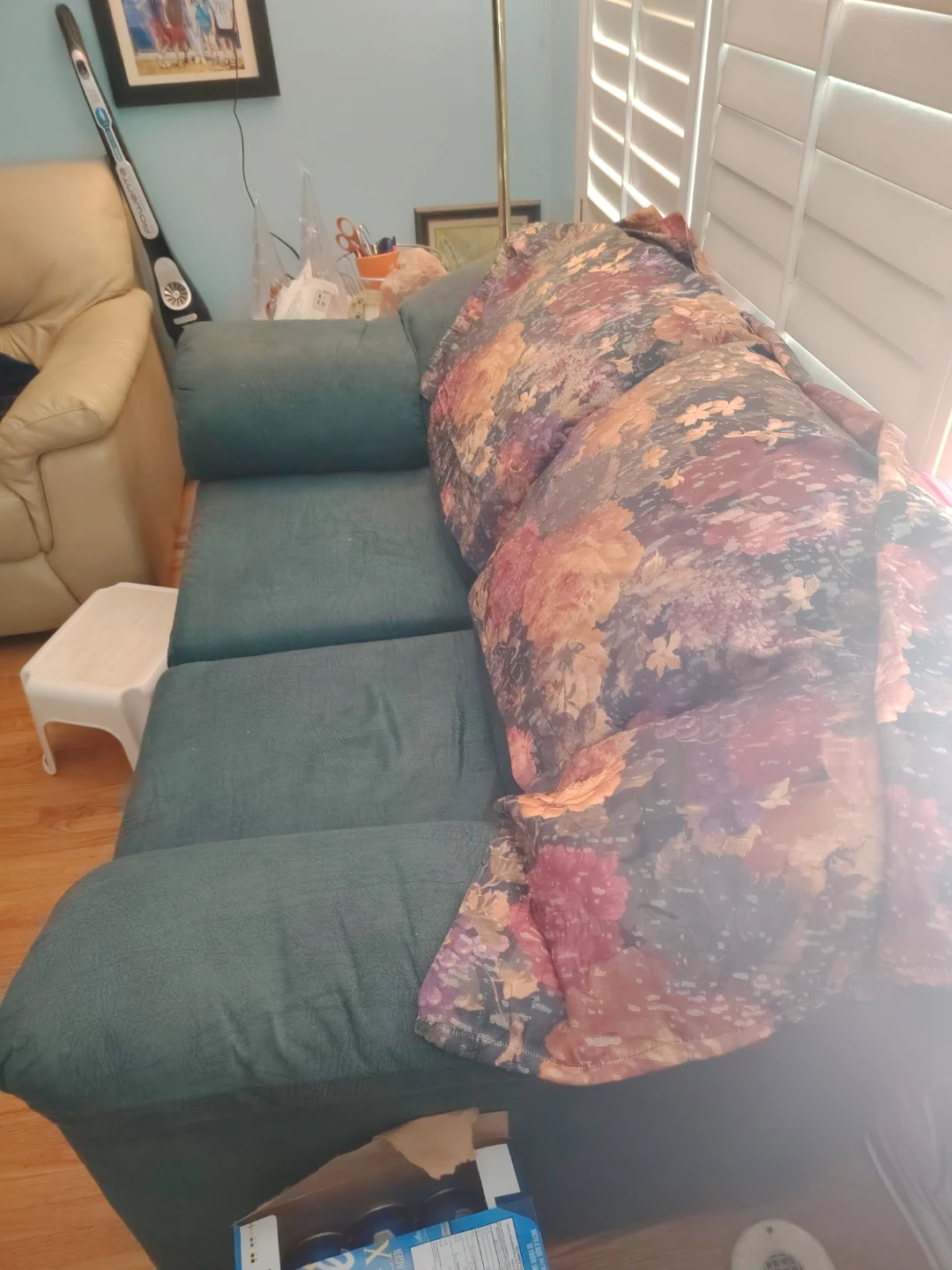 Dark green two-seater sofa