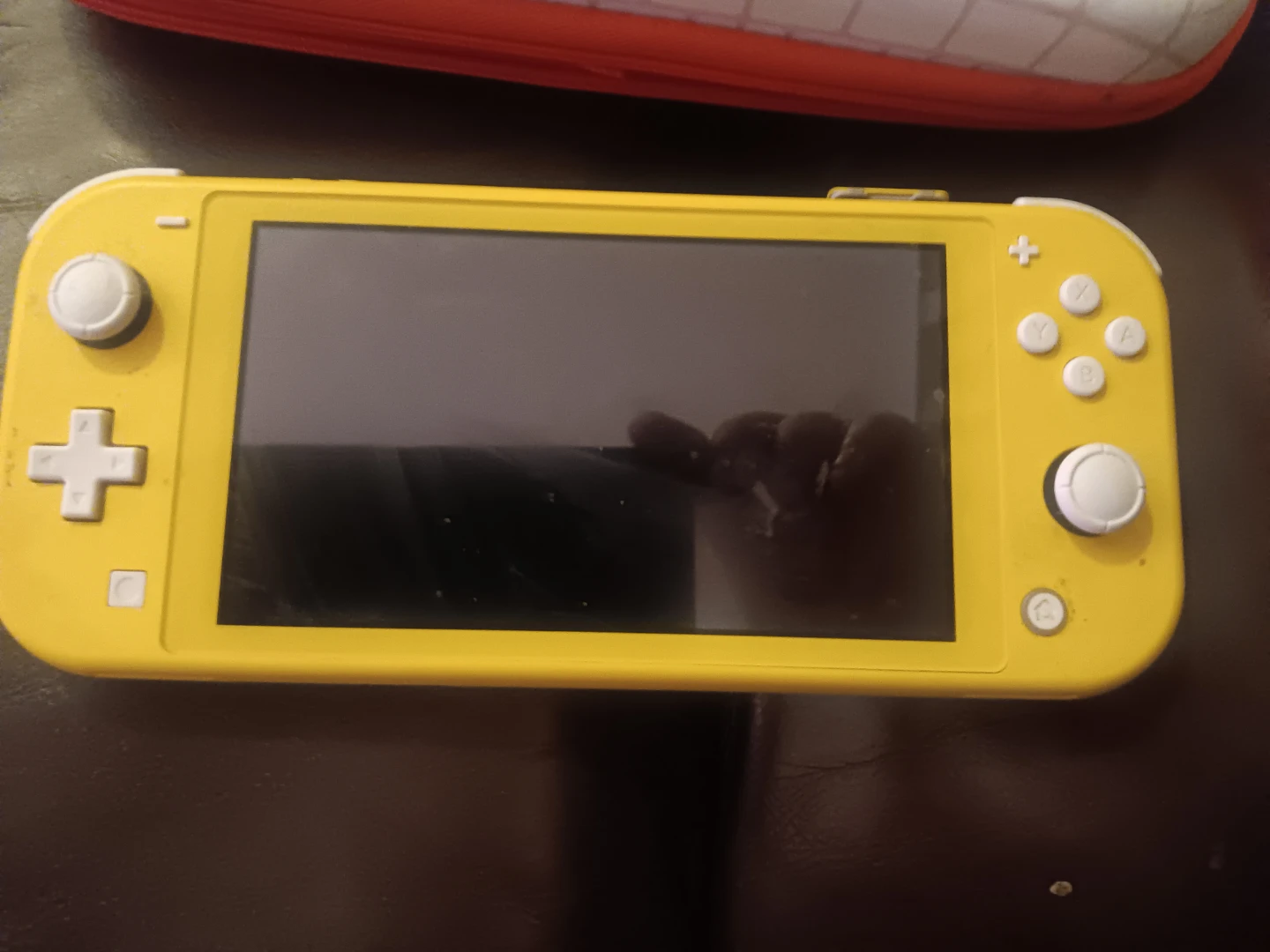 Nintendo Switch Lite Console with Games and Carrying Case