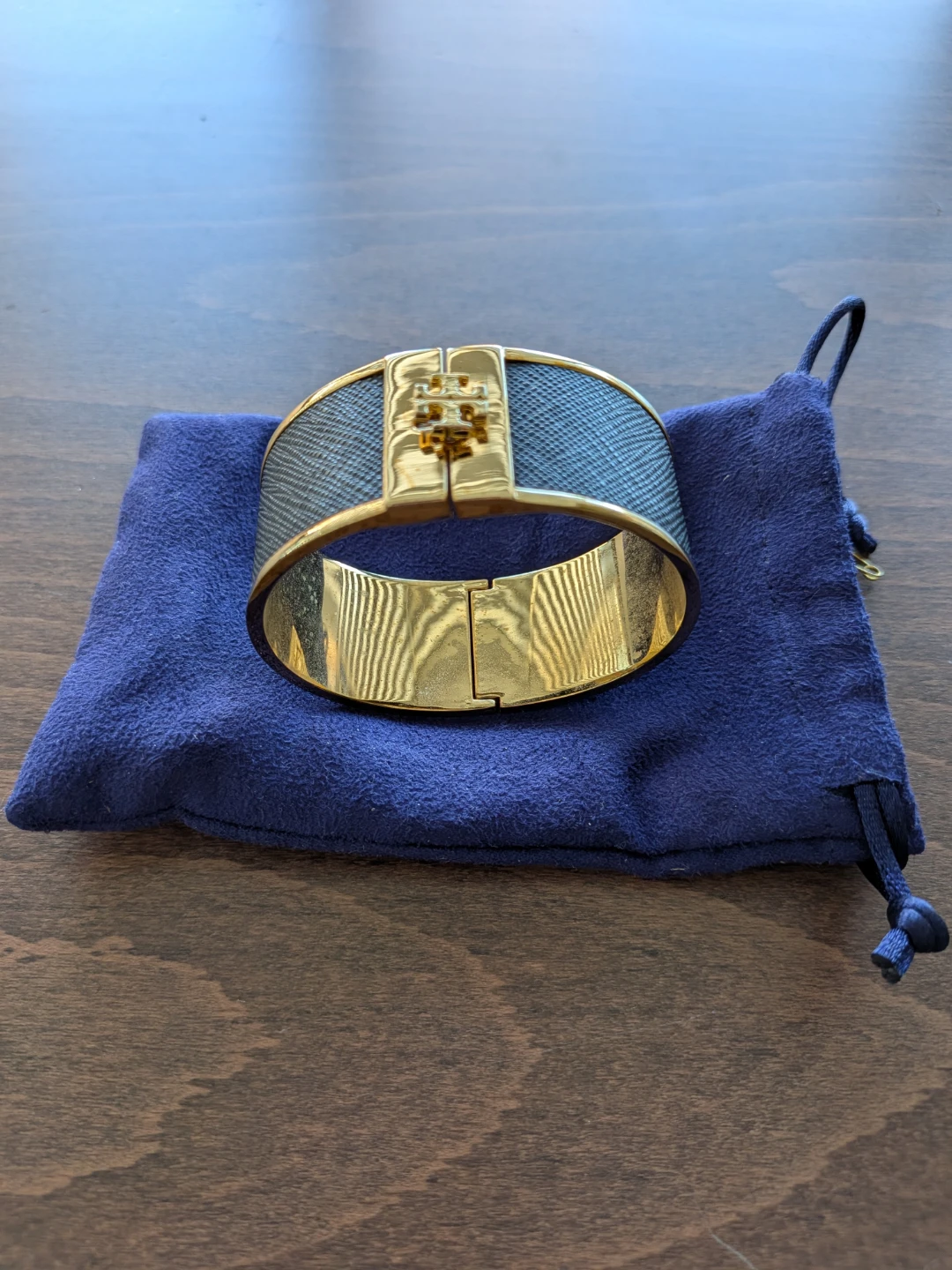 Two Tory Burch hinged cuff bracelets