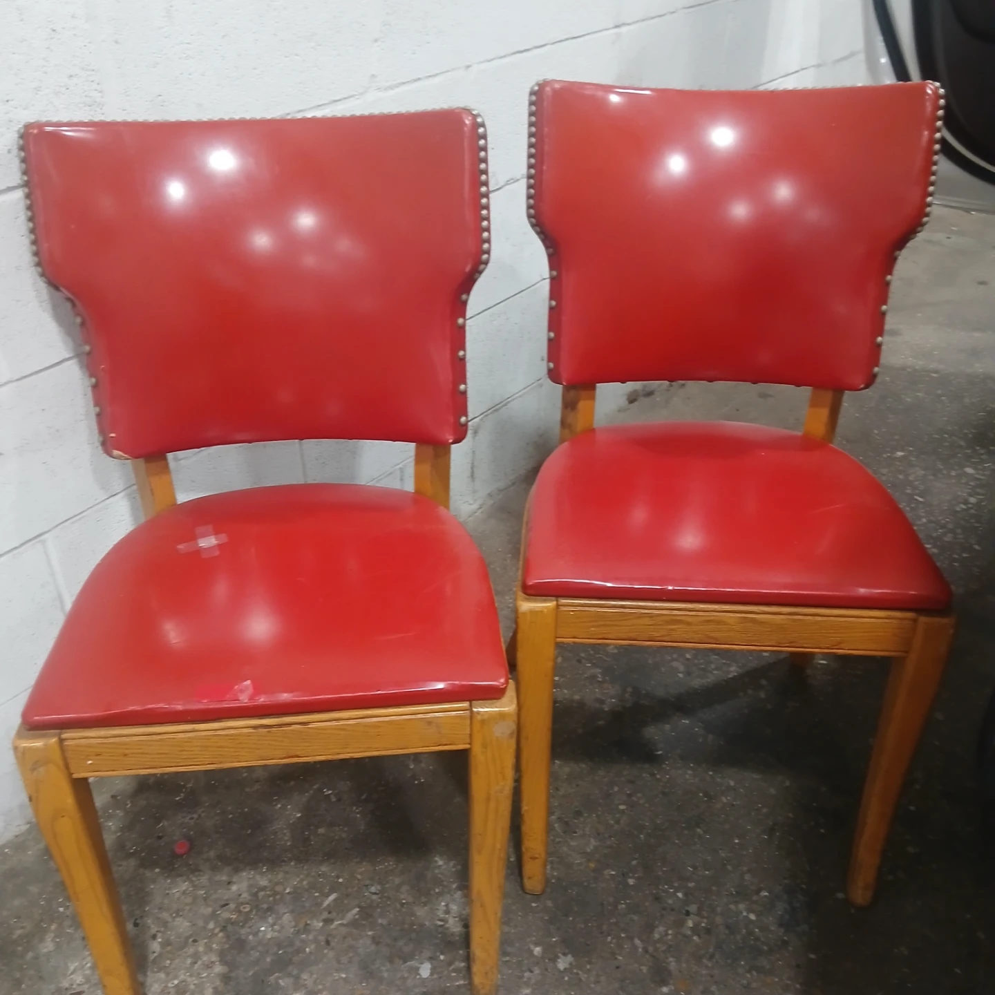 Two Vintage Red Vinyl Chairs