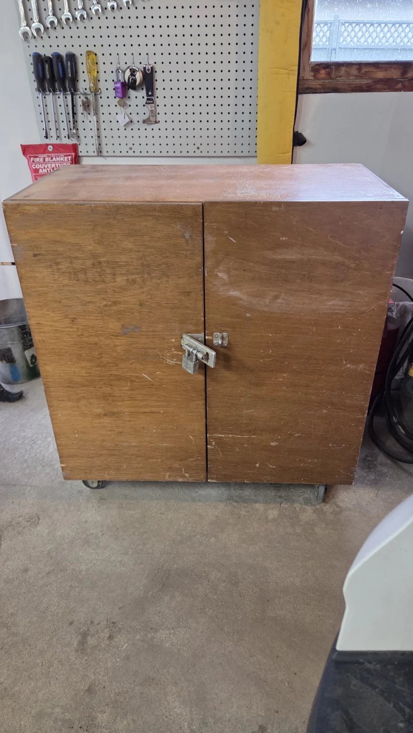 Wooden tool storage cabinet with wheels