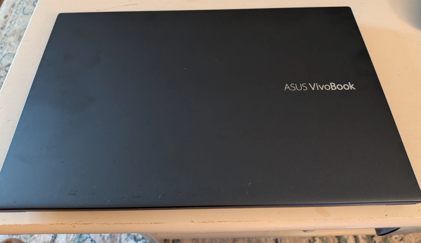 ASUS VivoBook Laptop with Mouse and Charger