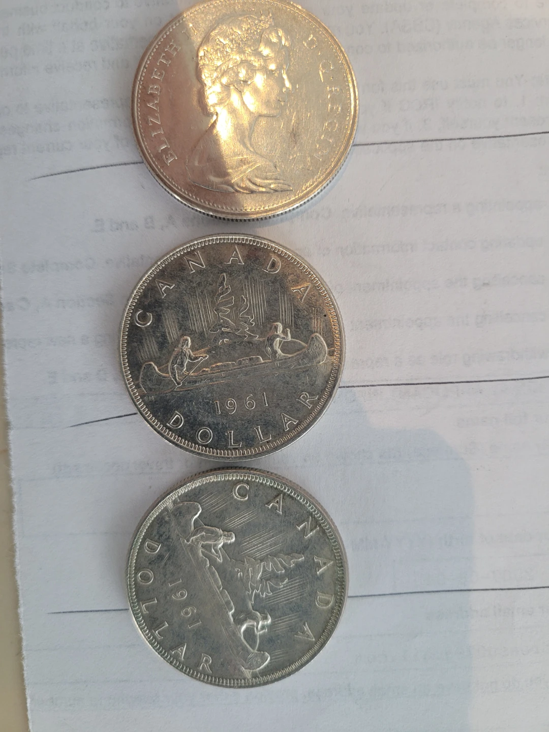 three Canada Dollar Coins - 1961