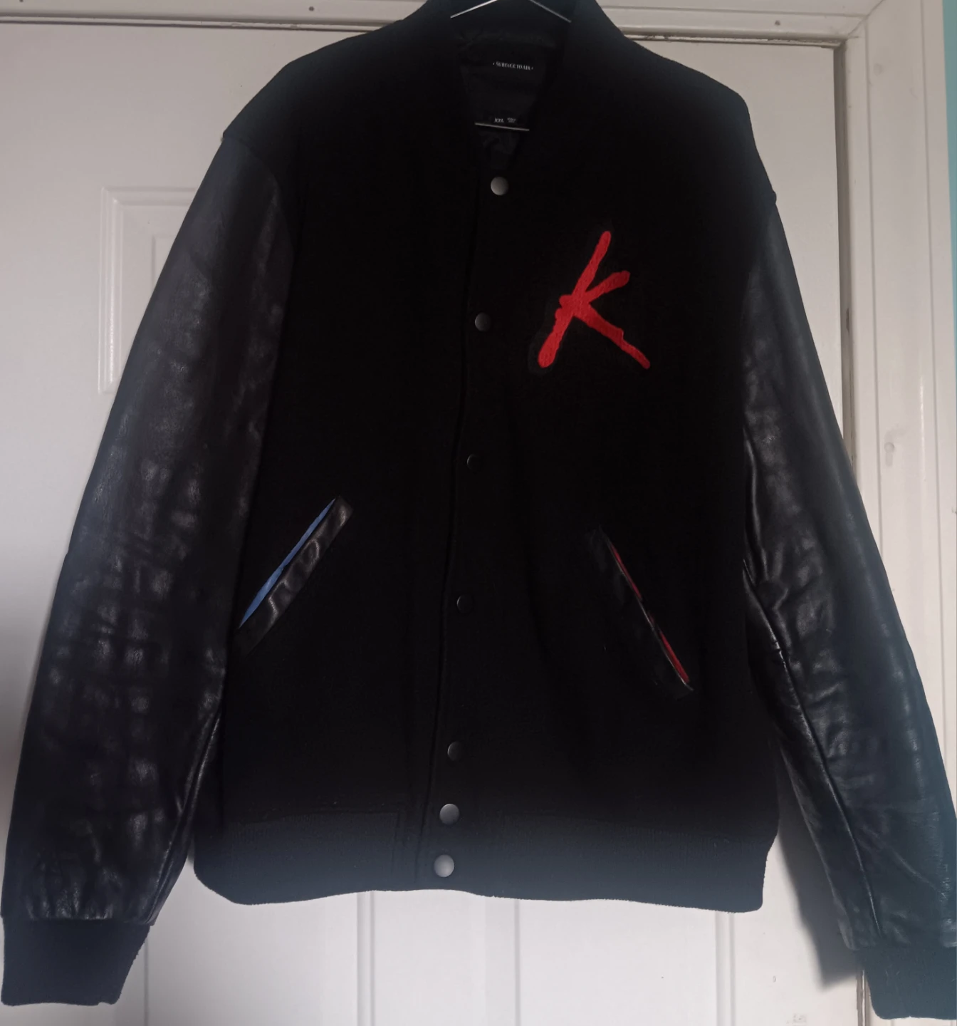Surface to Air Varsity Jacket