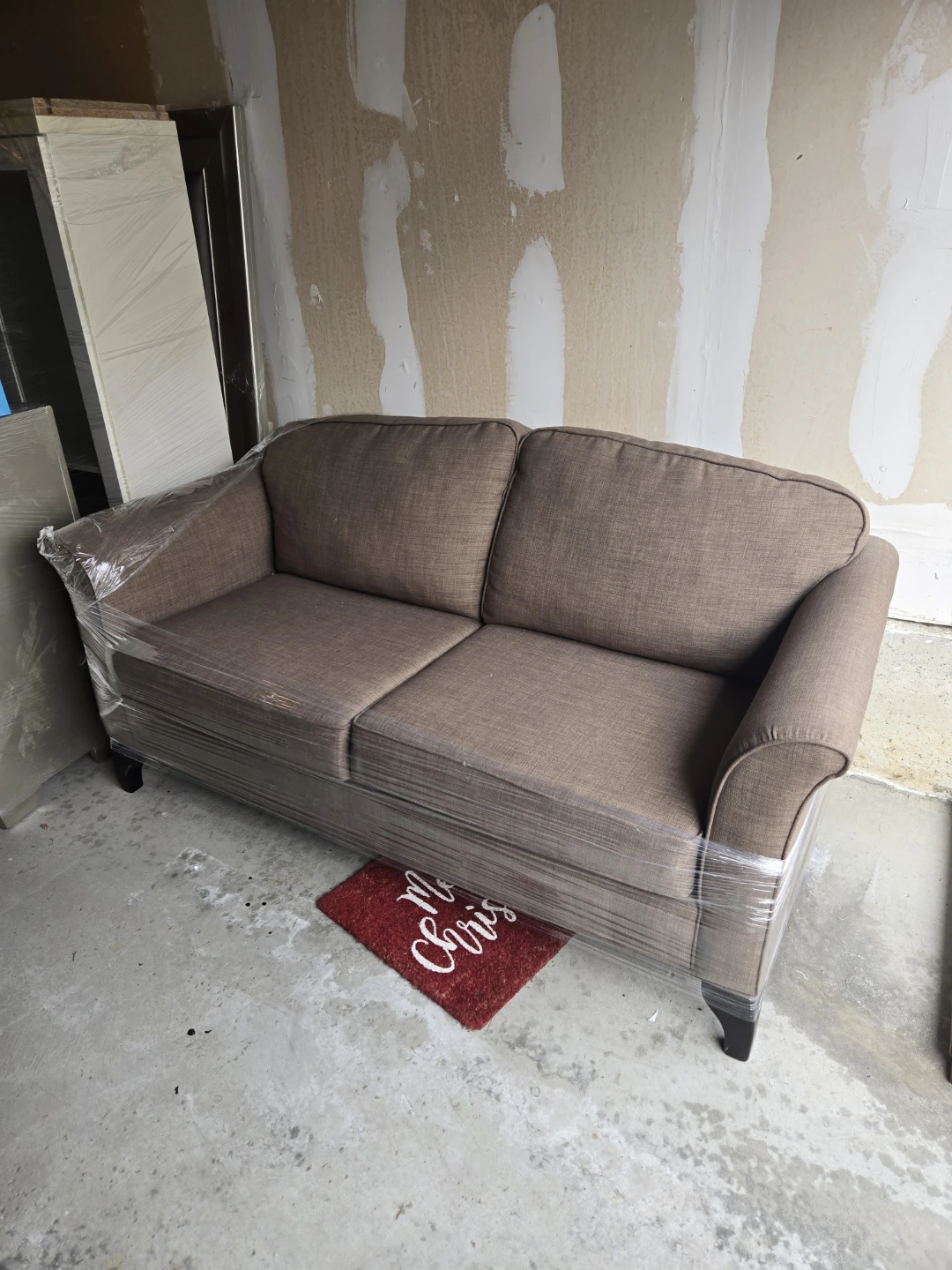 Brown Two-Seater Sofa