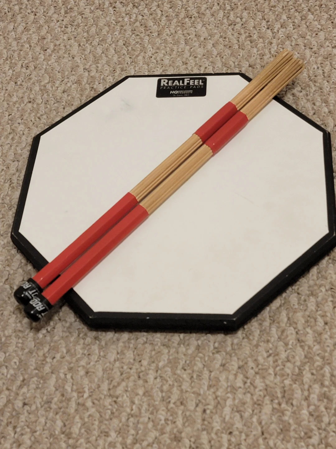 RealFeel Practice Pad with Rods Drumsticks