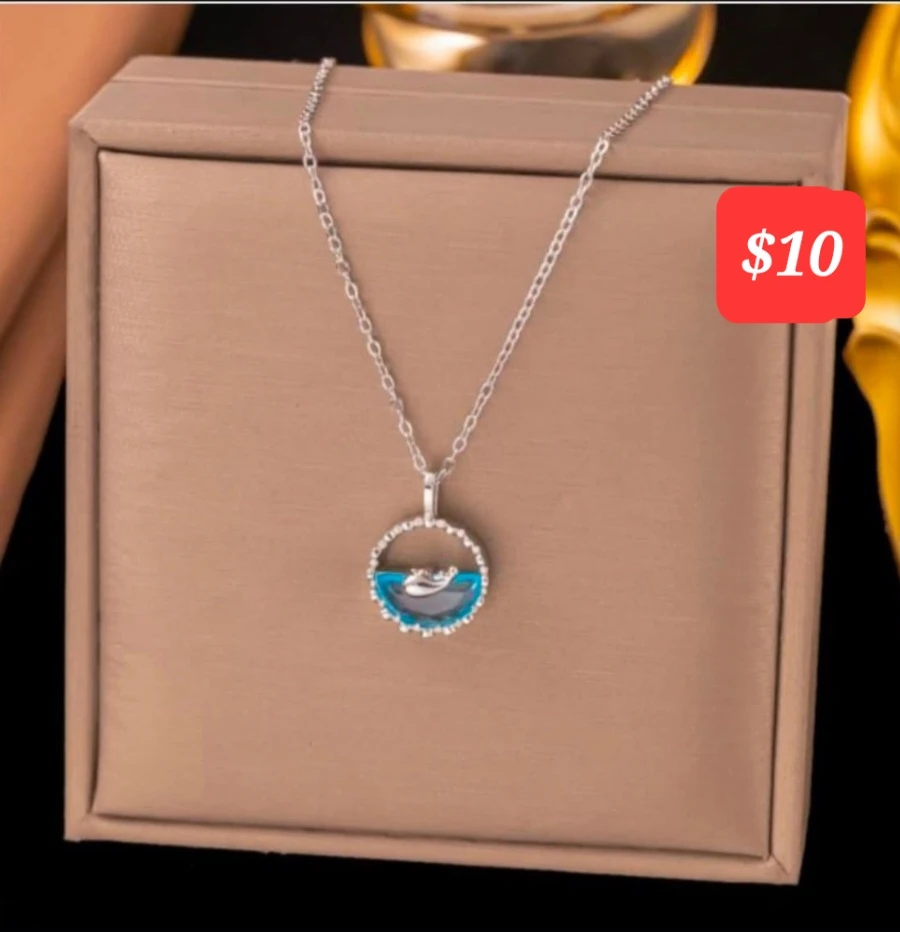 Silver Dolphin Pendant Necklace with Blue Accent