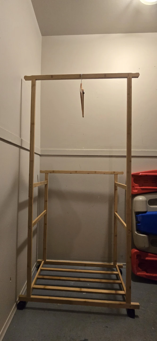 Wooden Rolling Clothing Rack – Like New - photo 3