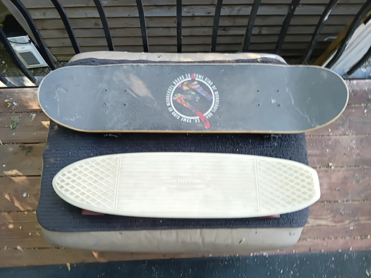 Pair Of Skateboards: Wonderufl Board Co and Super Surfer