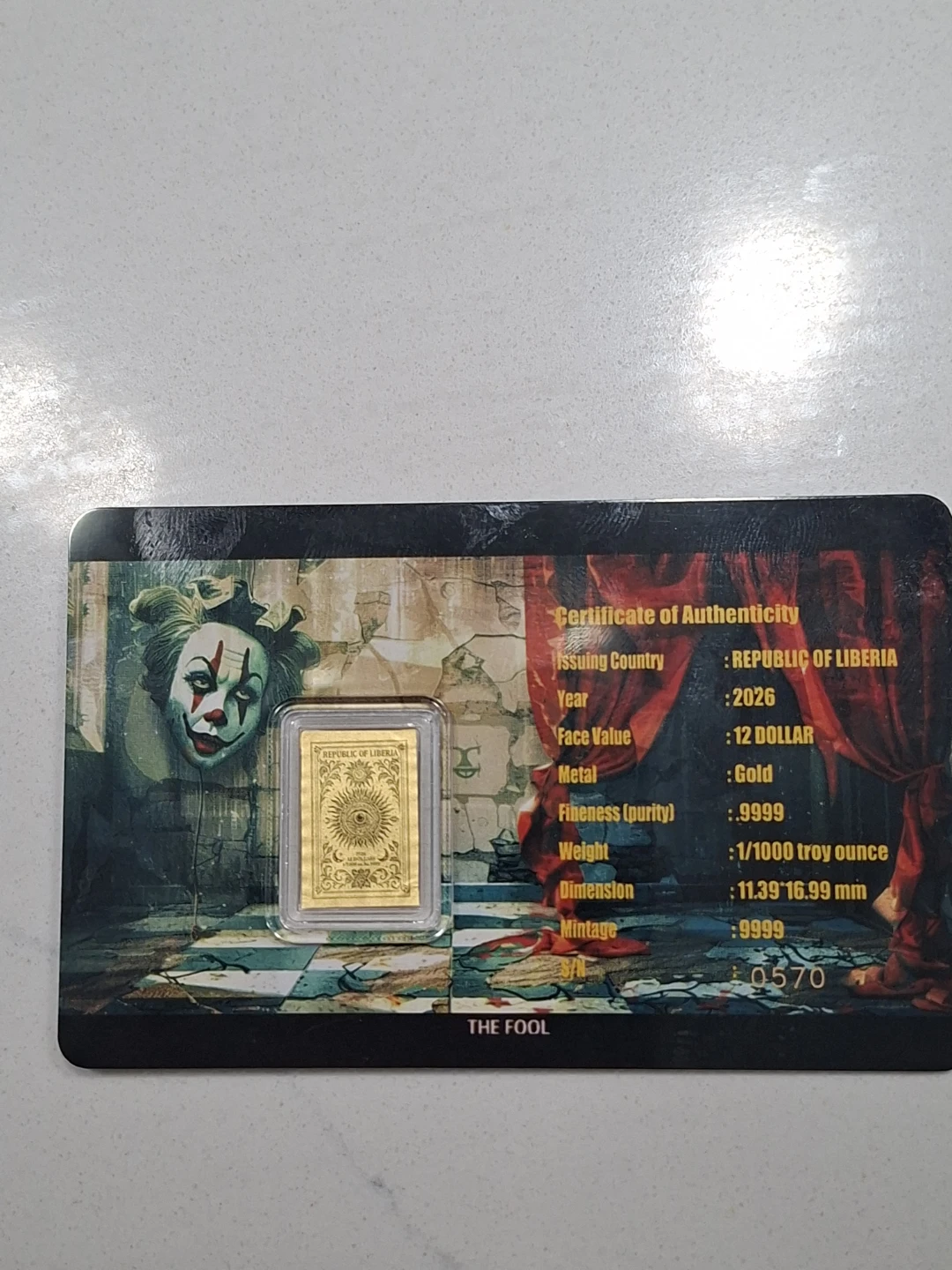The Fool 1/1000 troy ounce gold bar