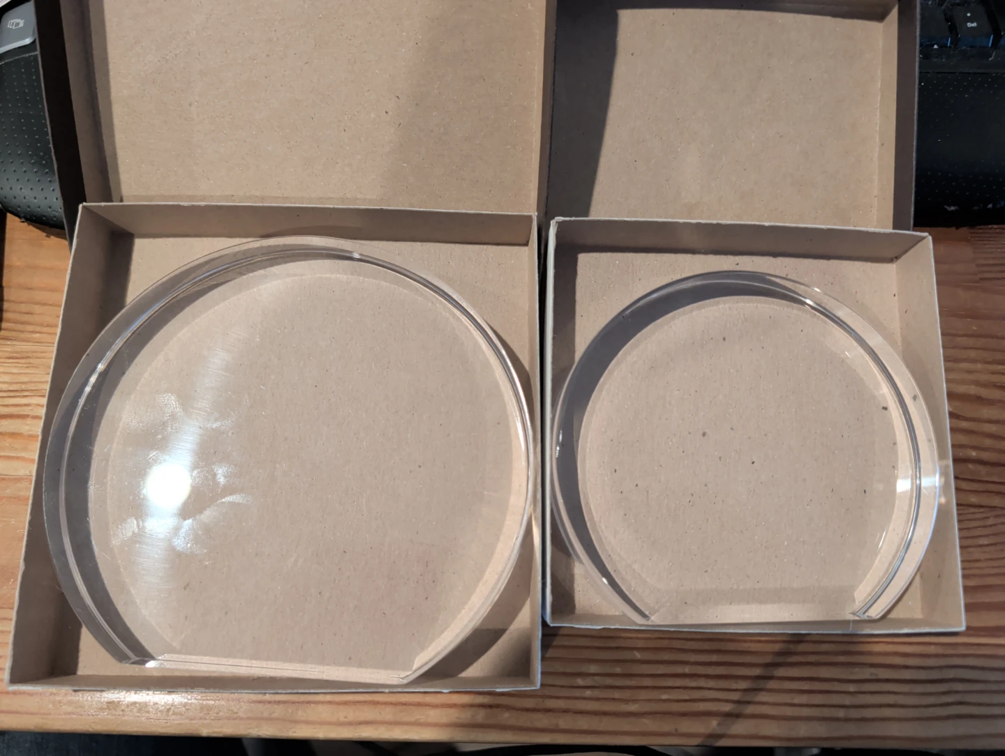 Two Clear Acrylic Circular Displays