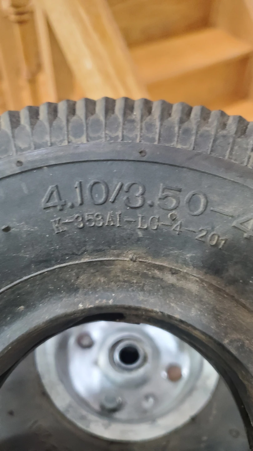 Two 4.10/3.50-4 Utility Tires with Wheels - photo 4