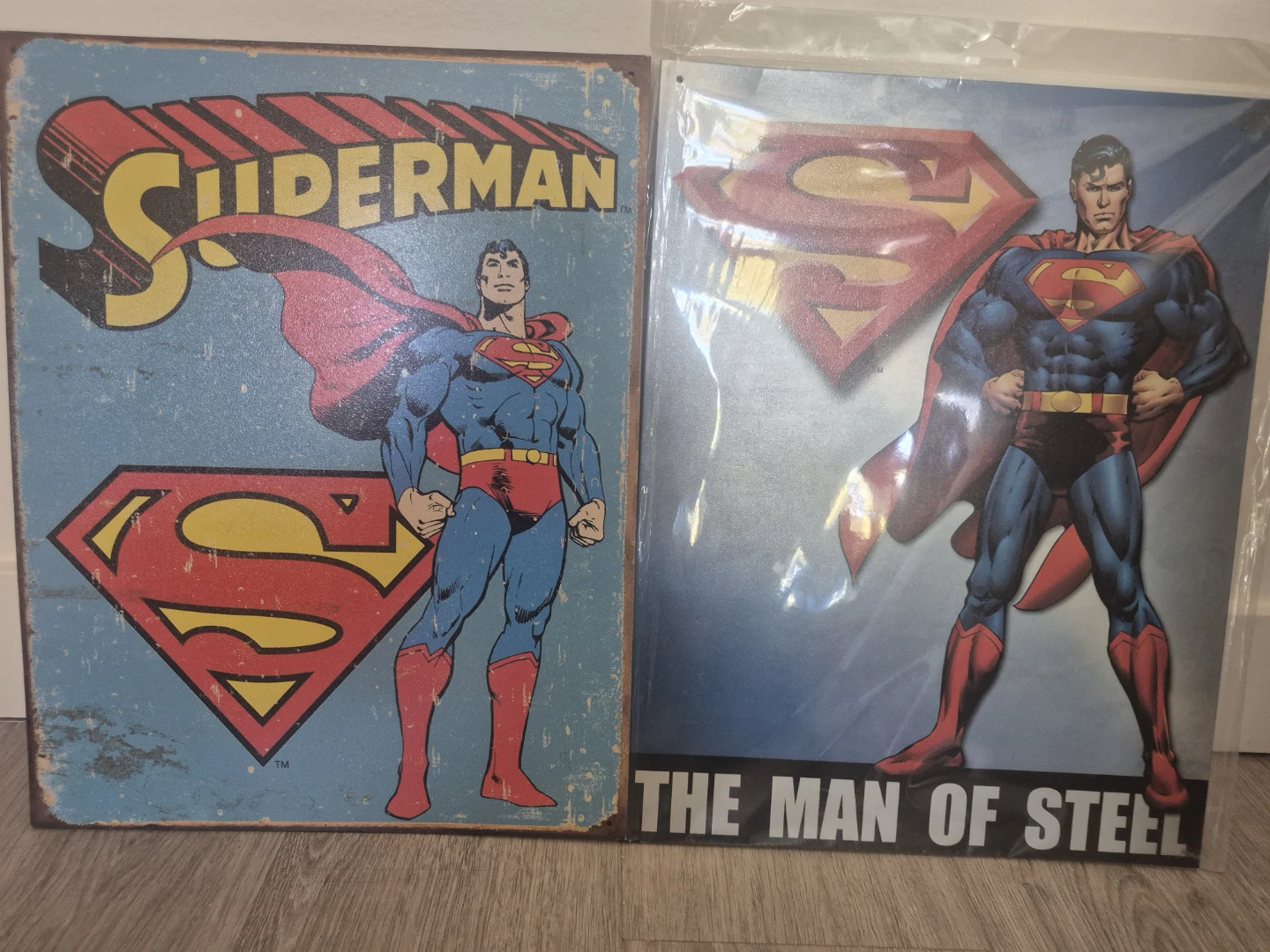 Two Superman Metal Signs