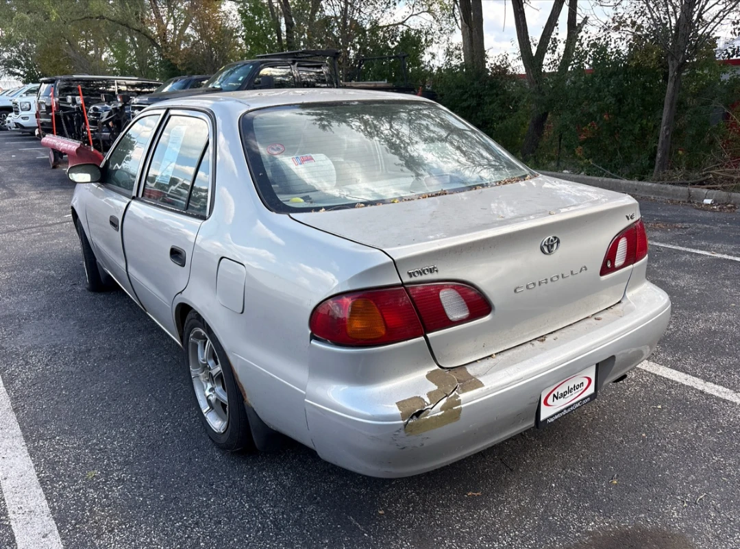 Silver 1999 Toyota Corolla CE Sedan - photo 4