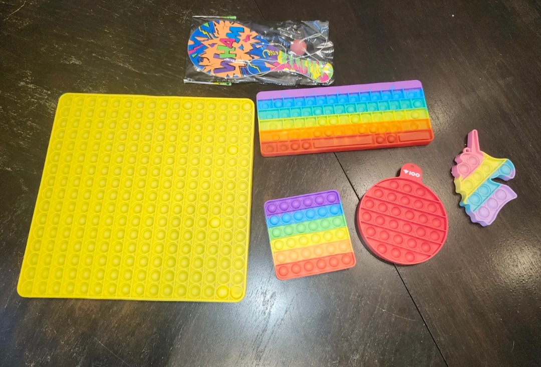 All - Assorted Fidget Toys and Paddle Ball Set