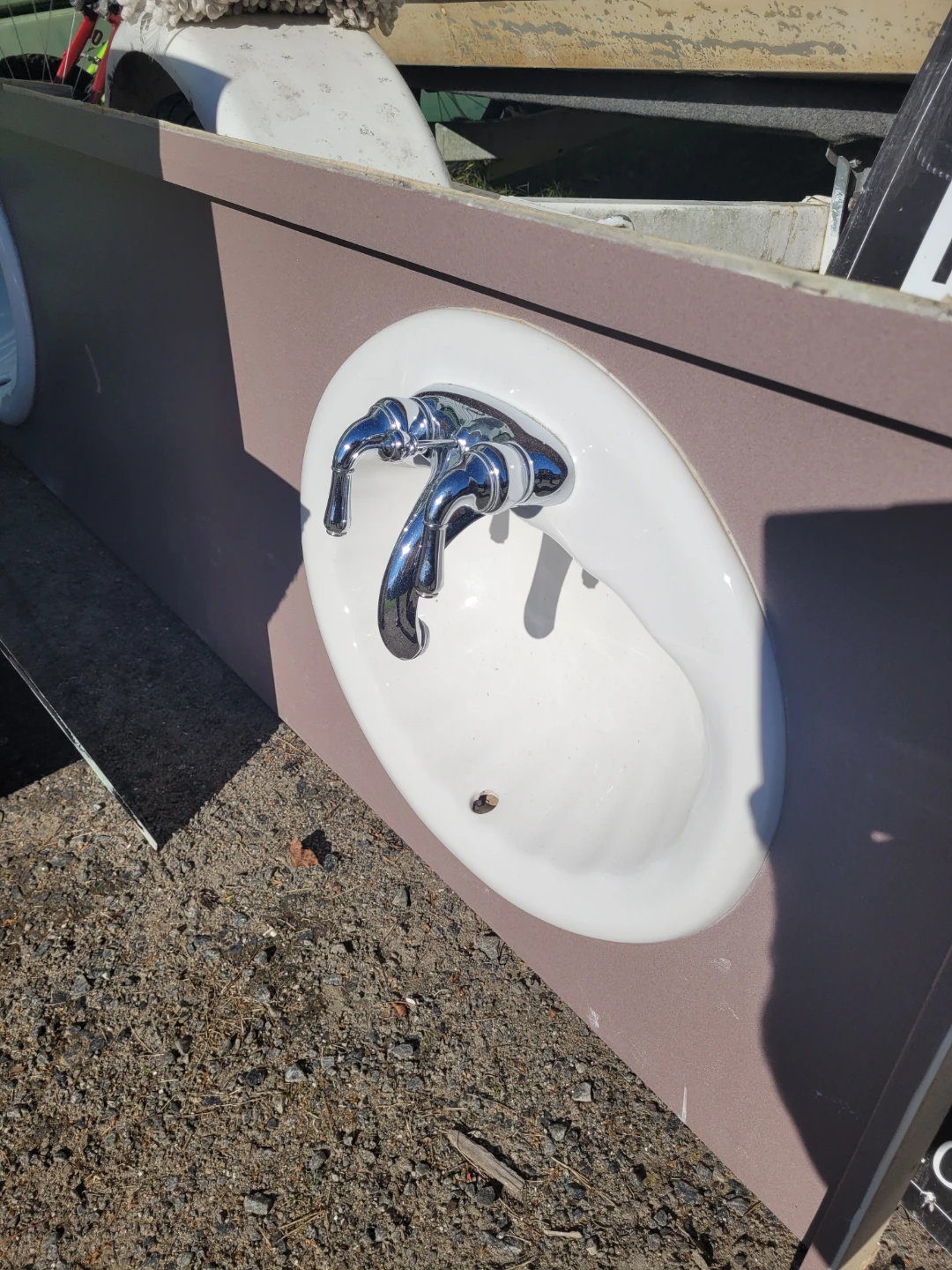 White bathroom sink with chrome faucet - photo 2