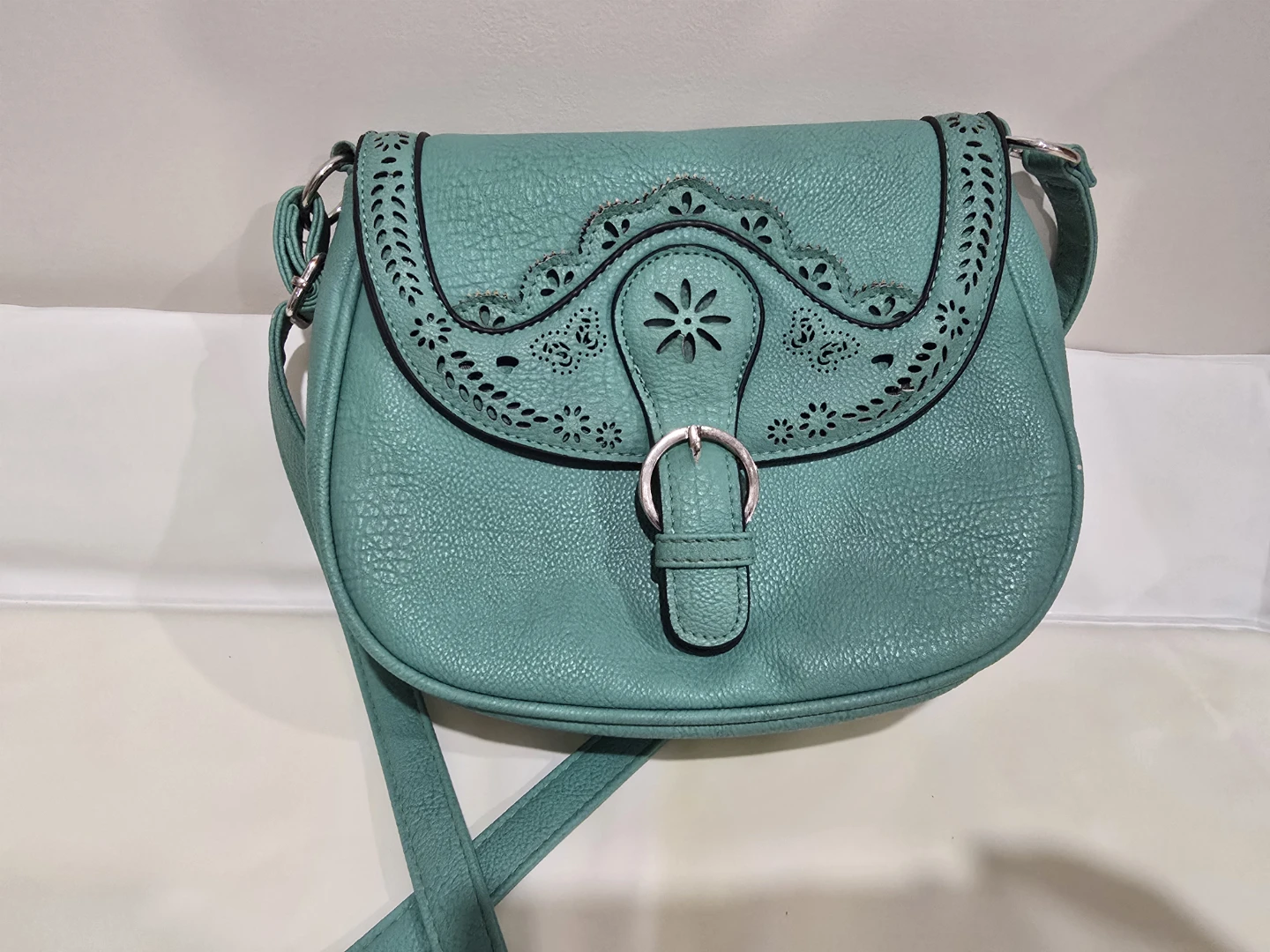 Turquoise Crossbody Purse with Laser-Cut Detail