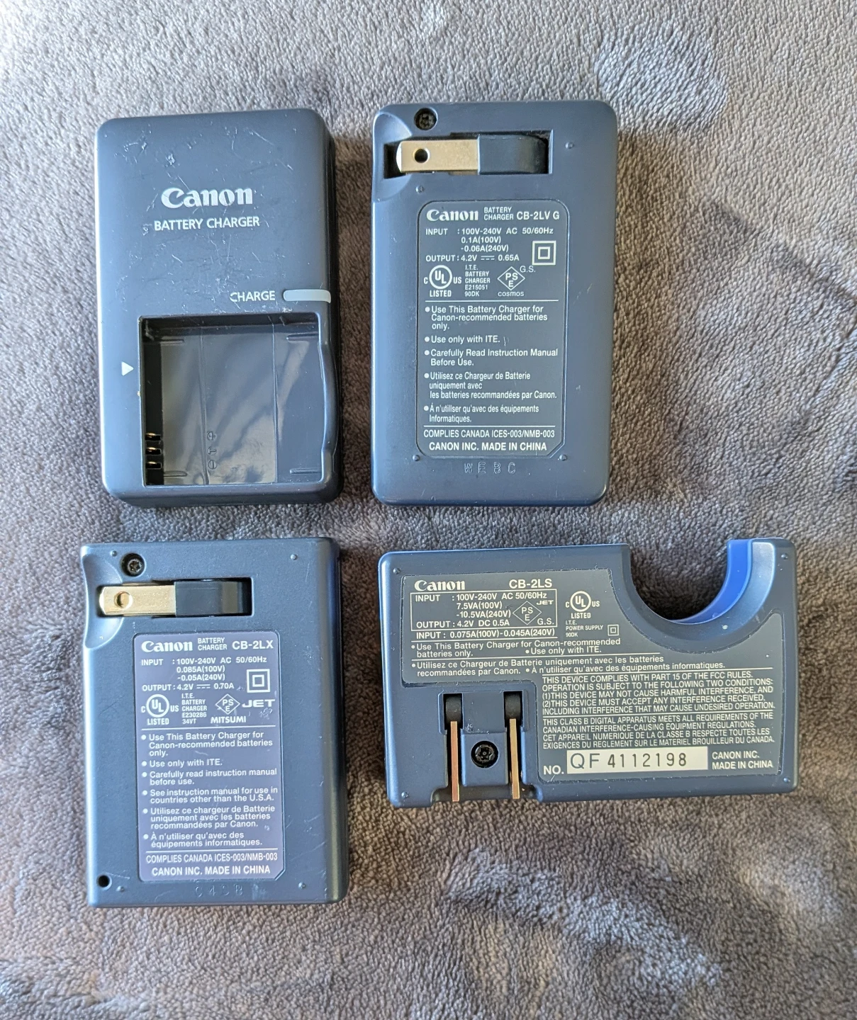 Assorted Canon Camera Battery Chargers and Adapters
