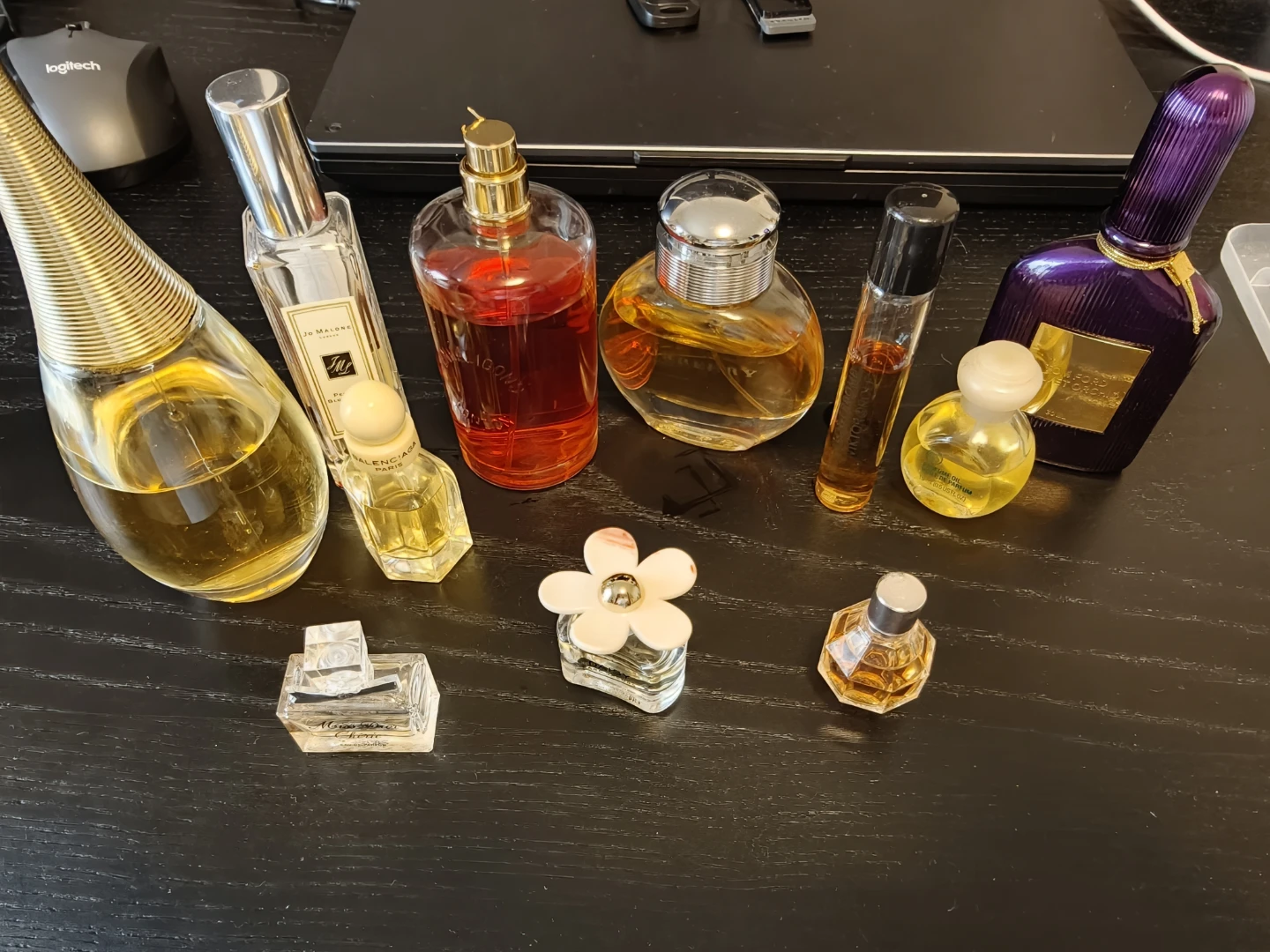 Assorted Designer Perfumes $20 large bottles, $10 small