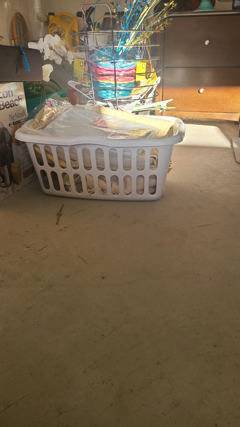 White plastic laundry basket