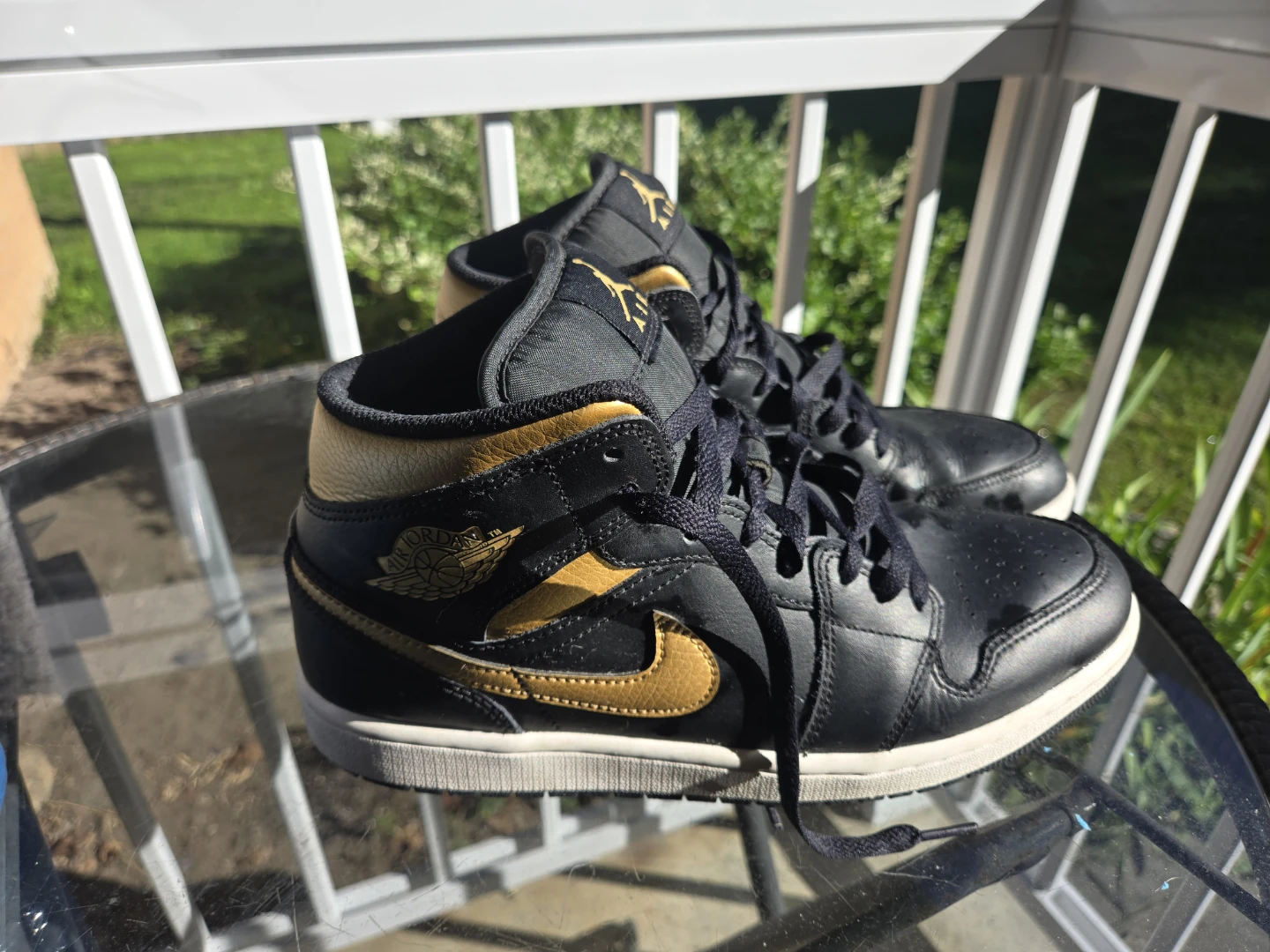 Air Jordan Mid Black and Gold Sneakers