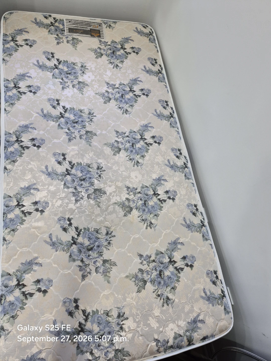Single Twin mattress with floral pattern