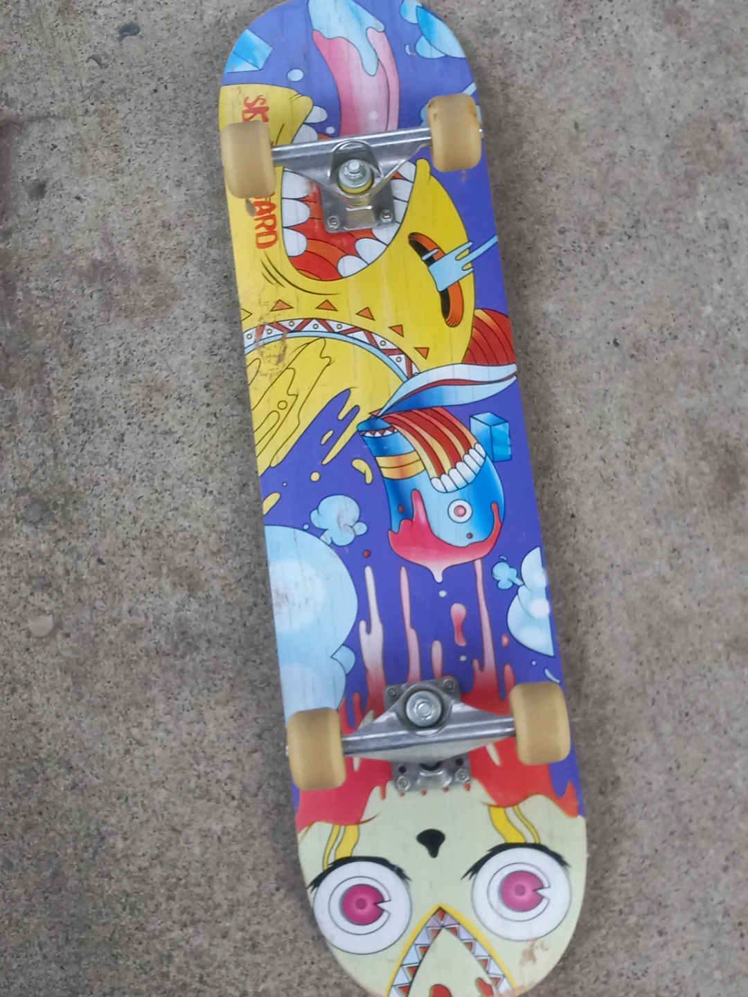 Skateboard with graphic deck