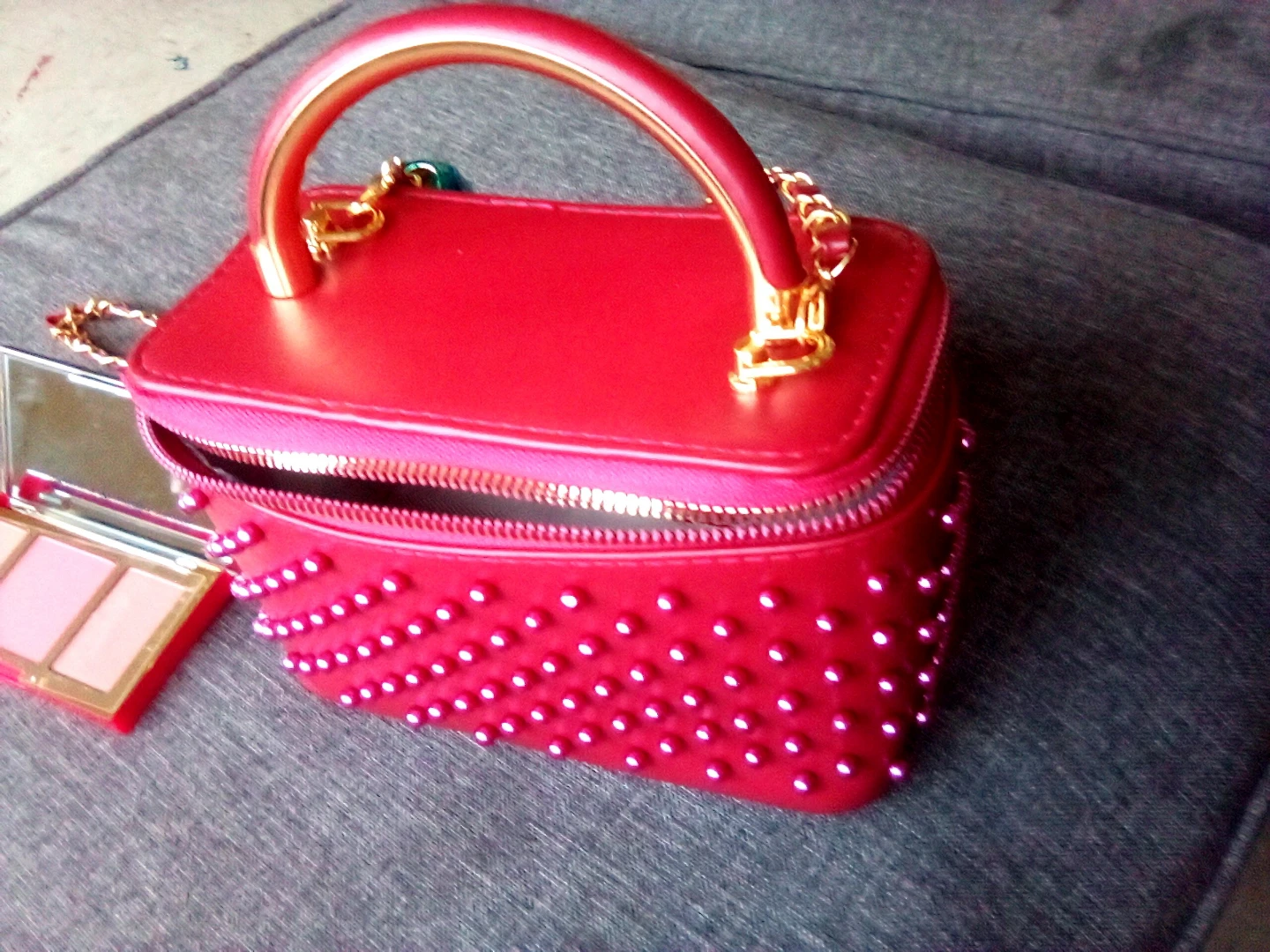 Red Studded Vanity Bag with Estee Lauder Palette
