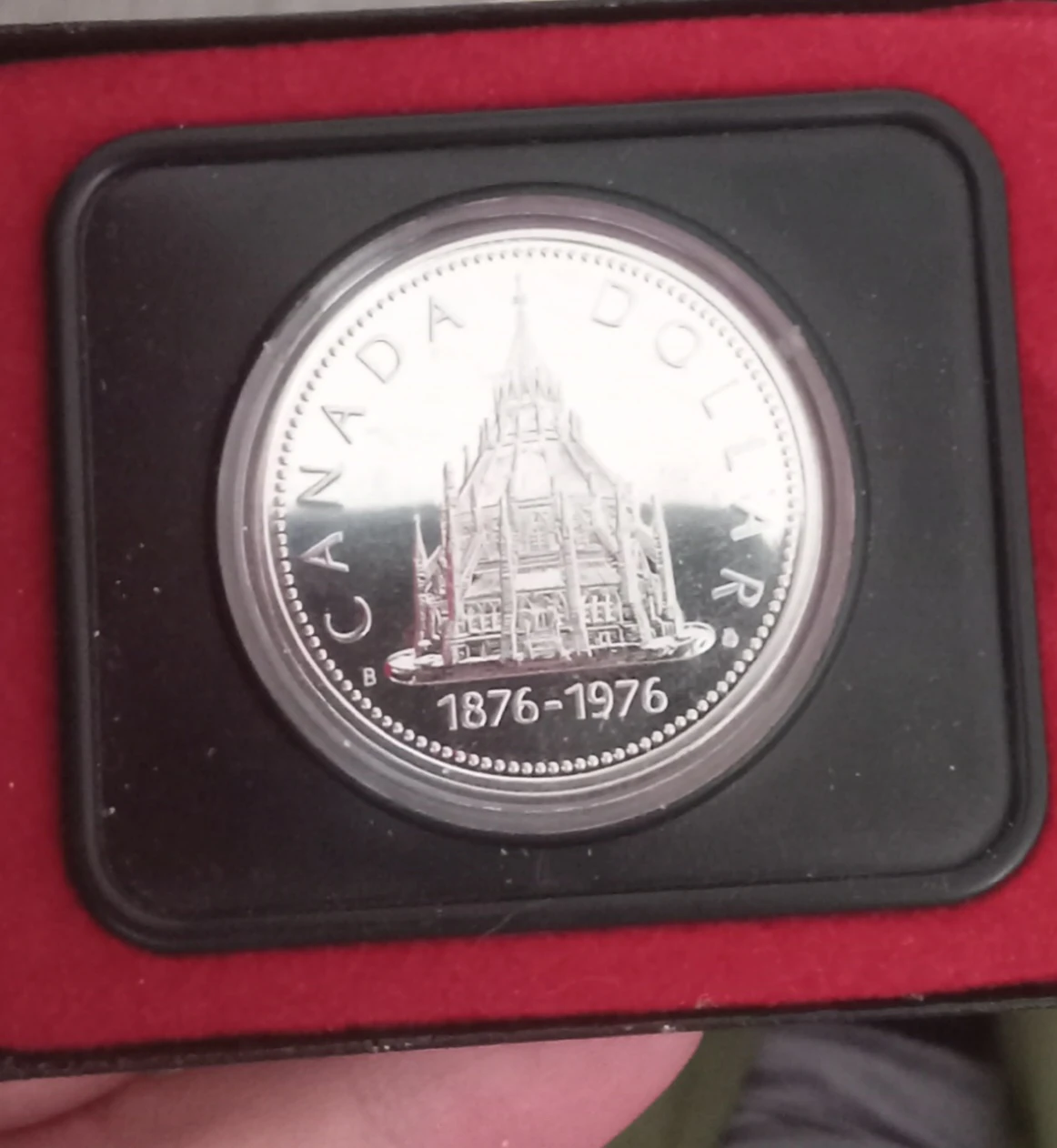 Library of parliament silver dollar