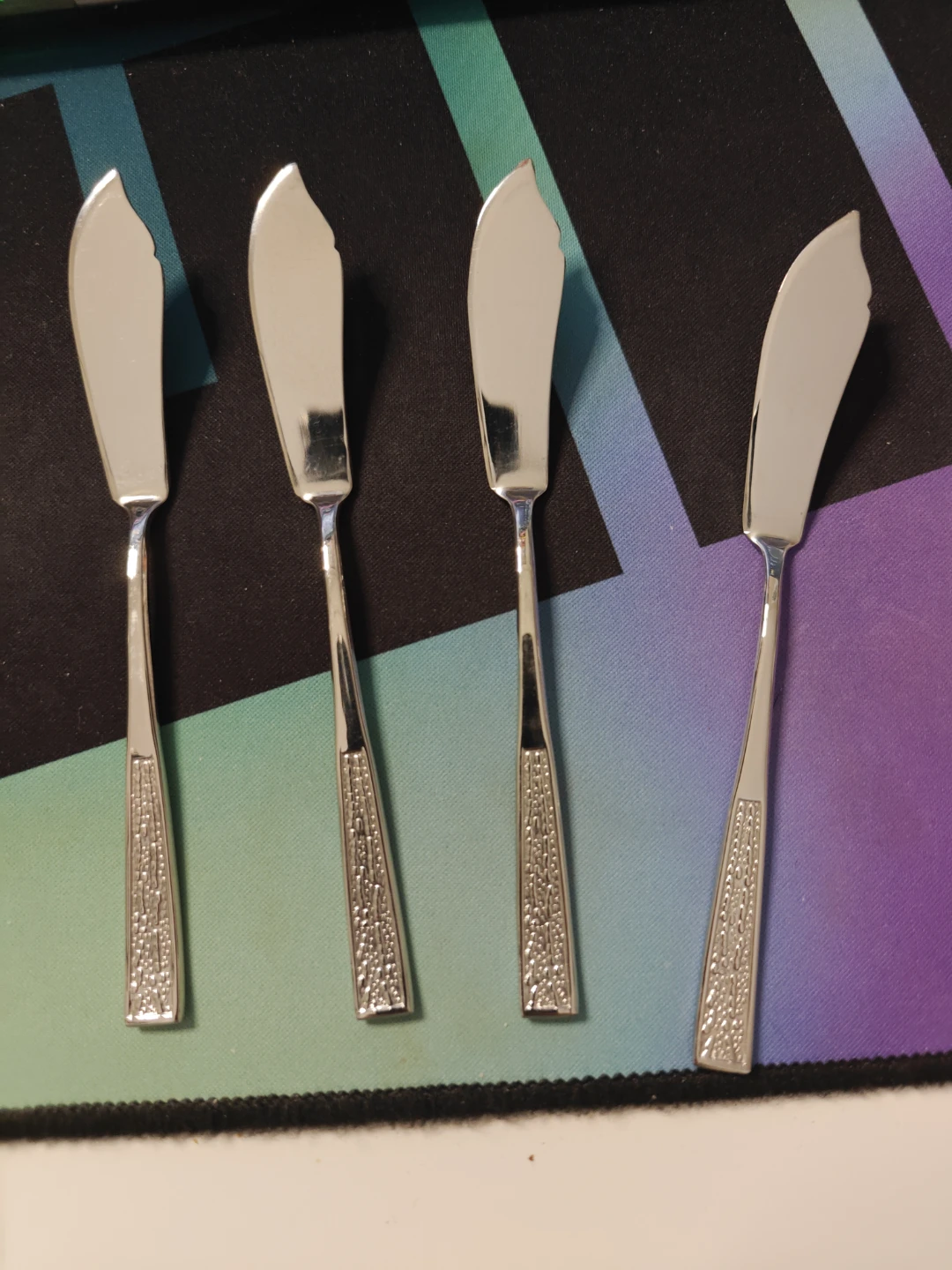 Set of 4 Silver-Tone Butter Knives