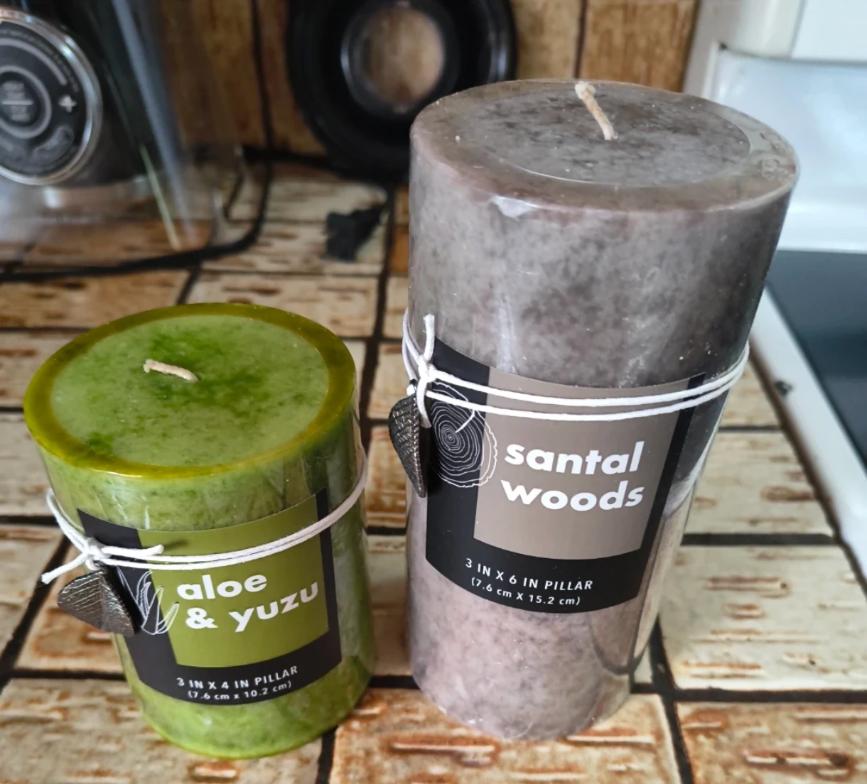 Two Alaura Candles: Aloe & Yuzu and Santal Woods