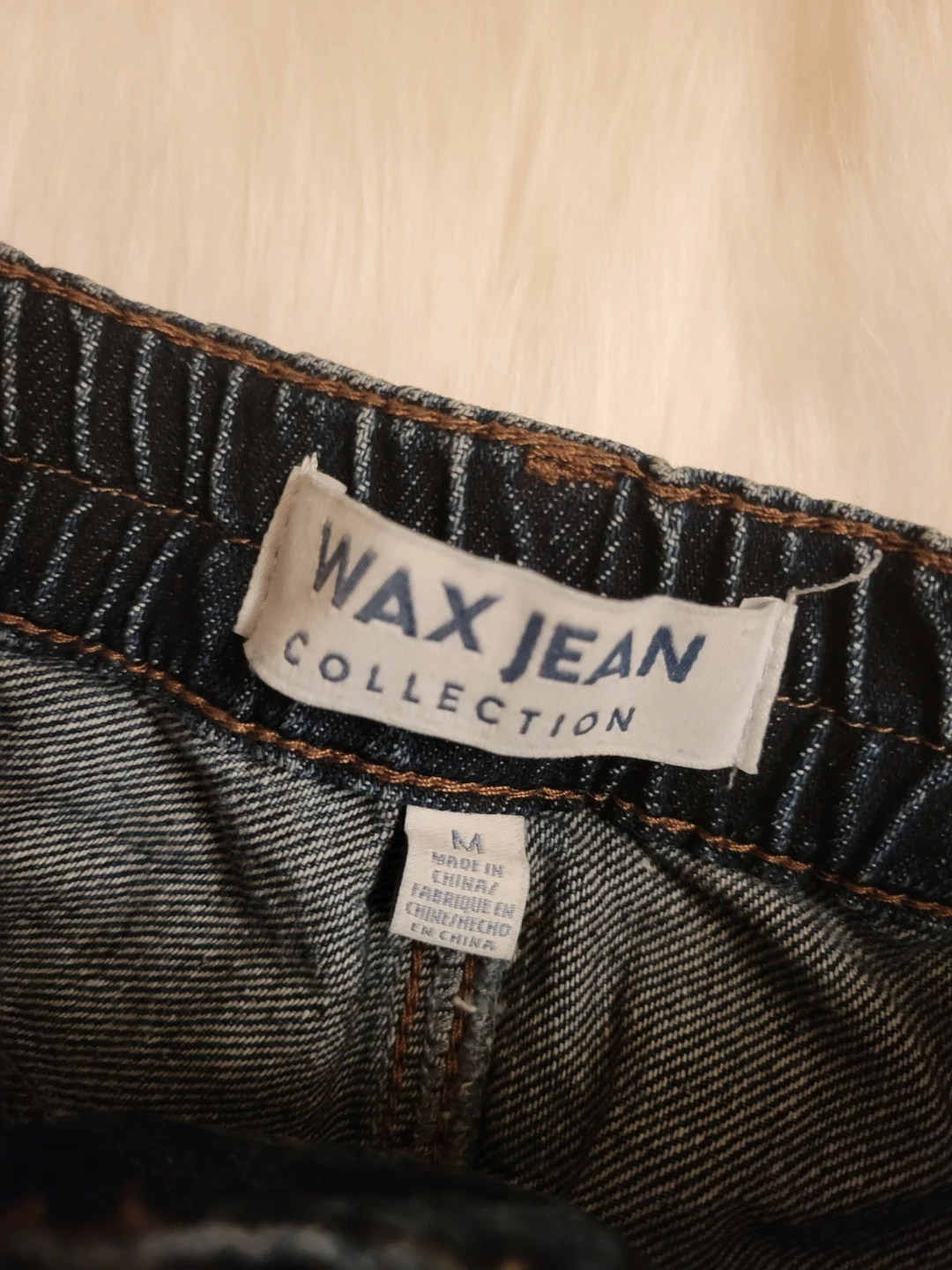 Two pairs of distressed blue jeans - photo 3