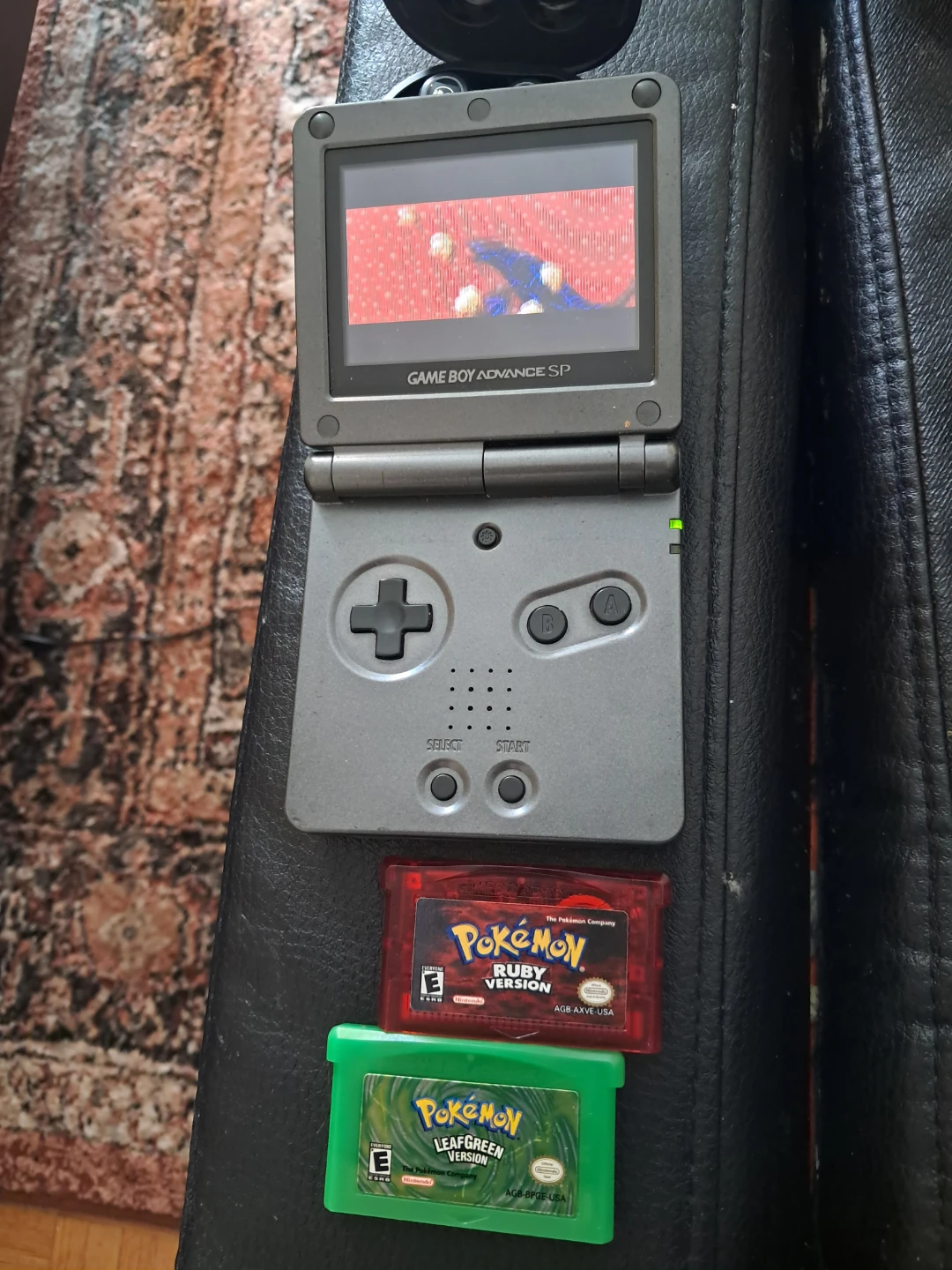 Nintendo Game Boy Advance SP with Pokémon Ruby and LeafGreen