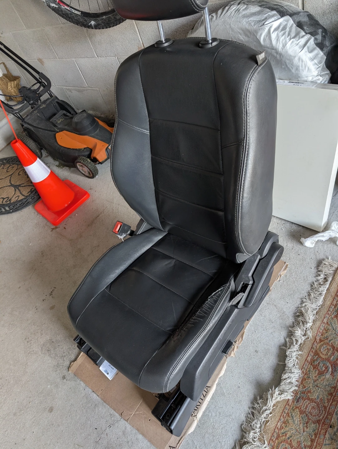 Dark Grey leather automotive bucket driver's seat