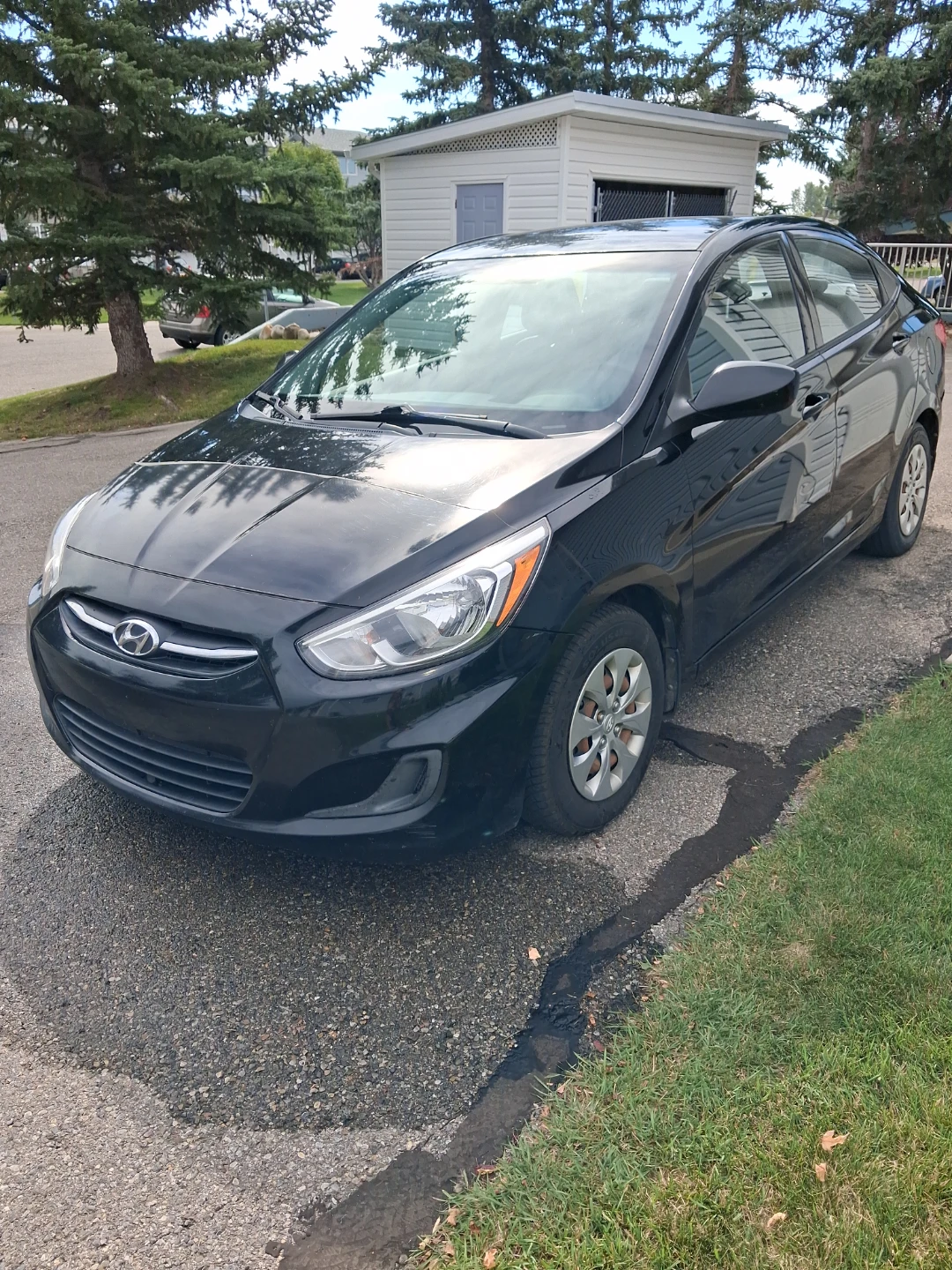 Black Hyundai Accent sedan