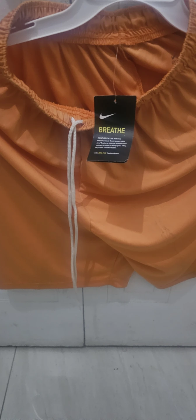 Nike Breathe Orange Athletic Shorts