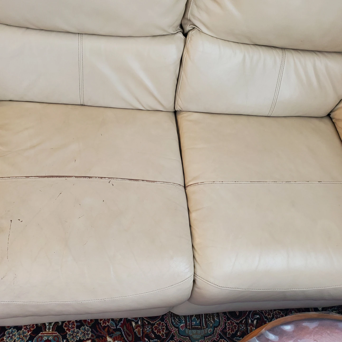 Cream Leather Sofa with Reclining Seats and Cup Holders