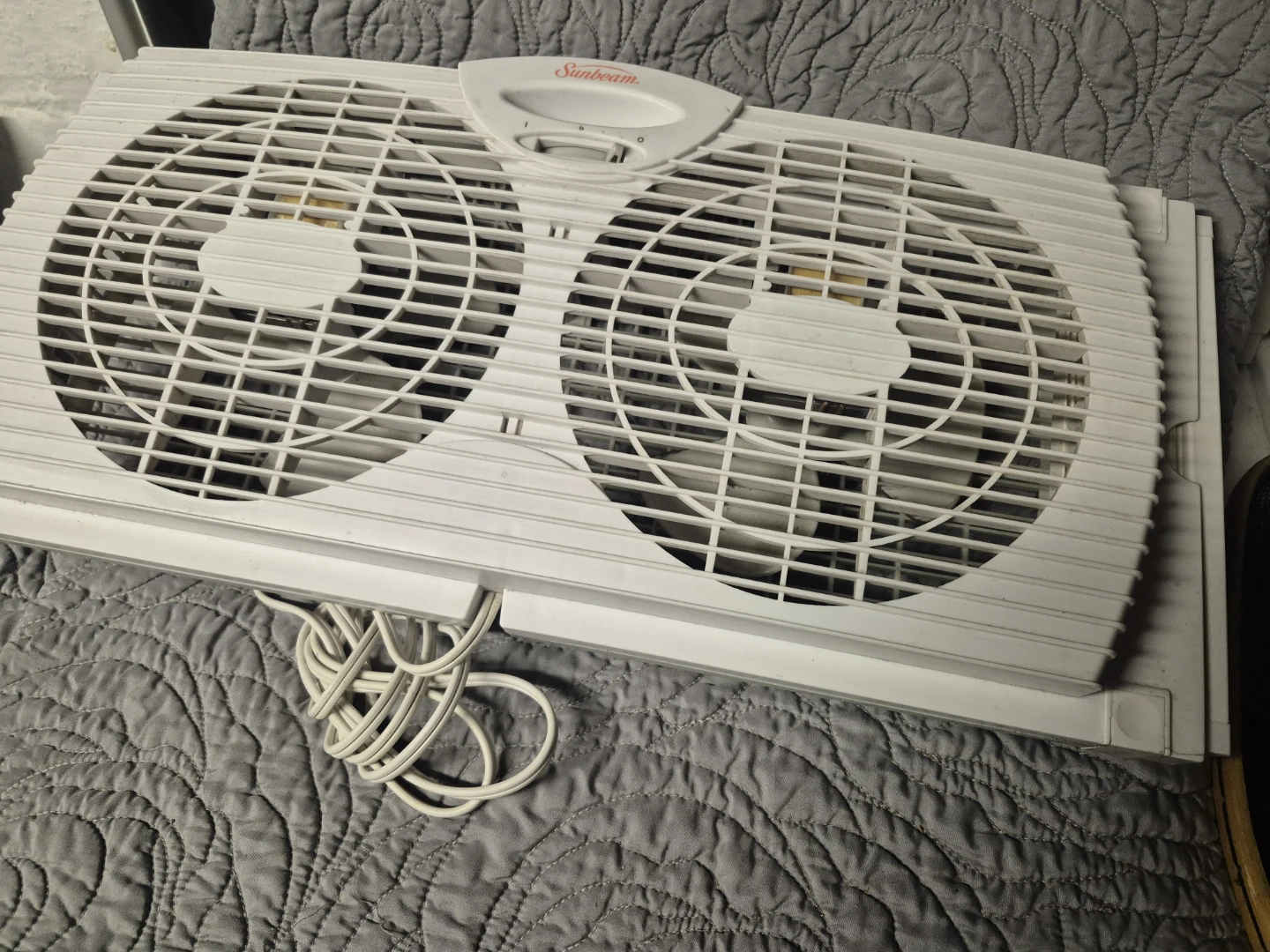 Sunbeam Dual-Blade Portable Window Fan with Accordion Side Panel