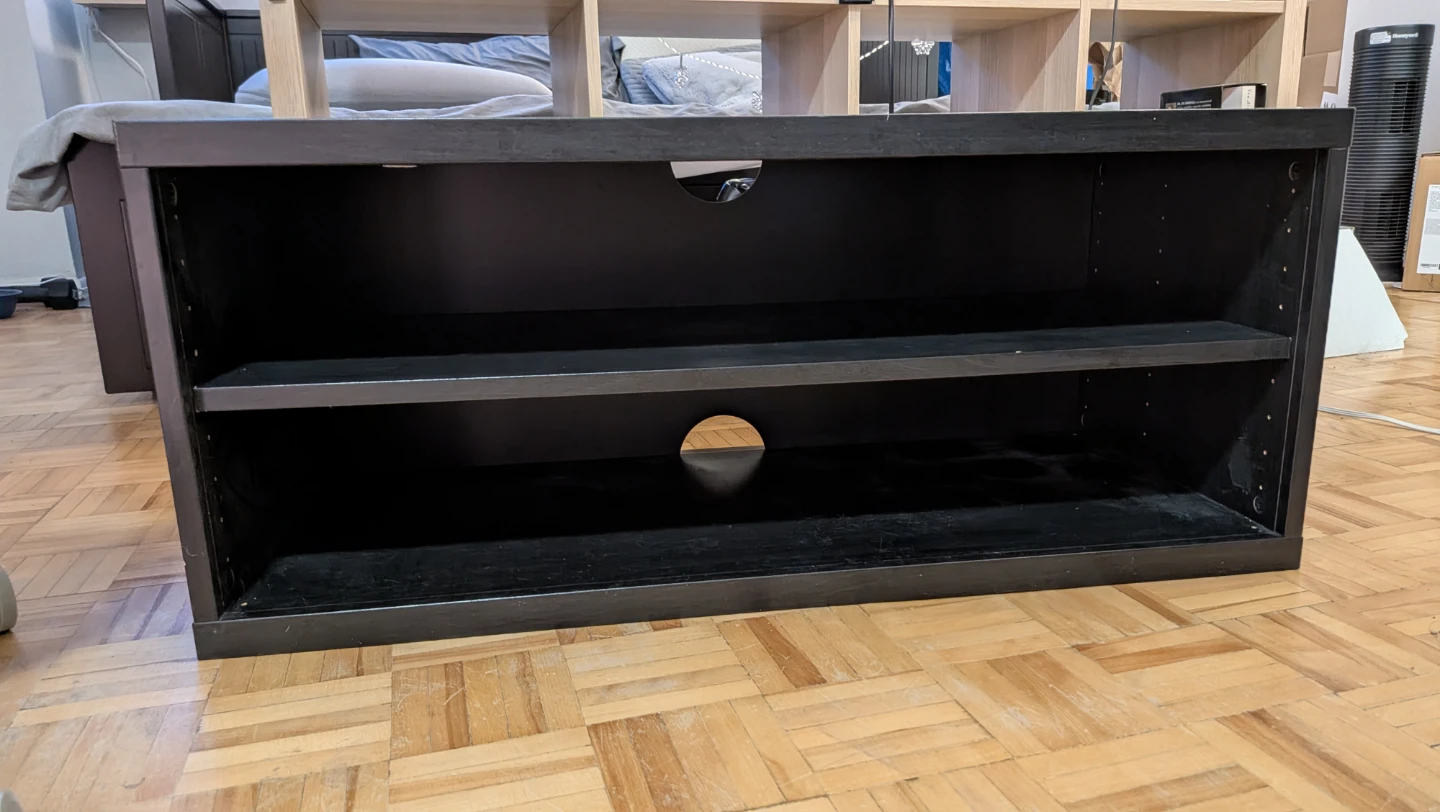 Black media console with shelves