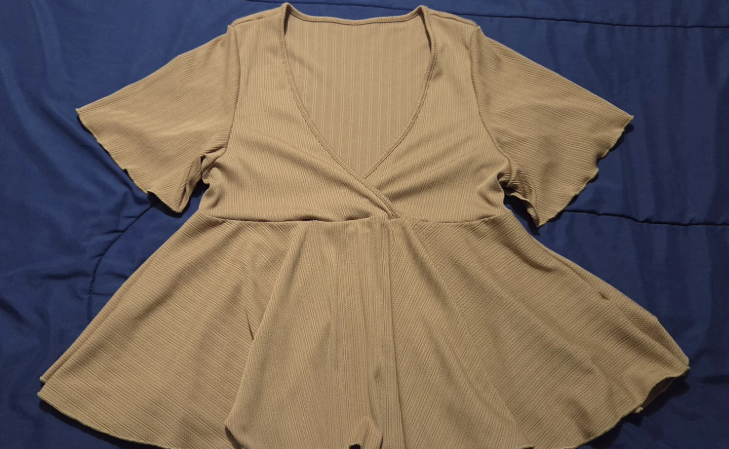 Tan ribbed peplum top