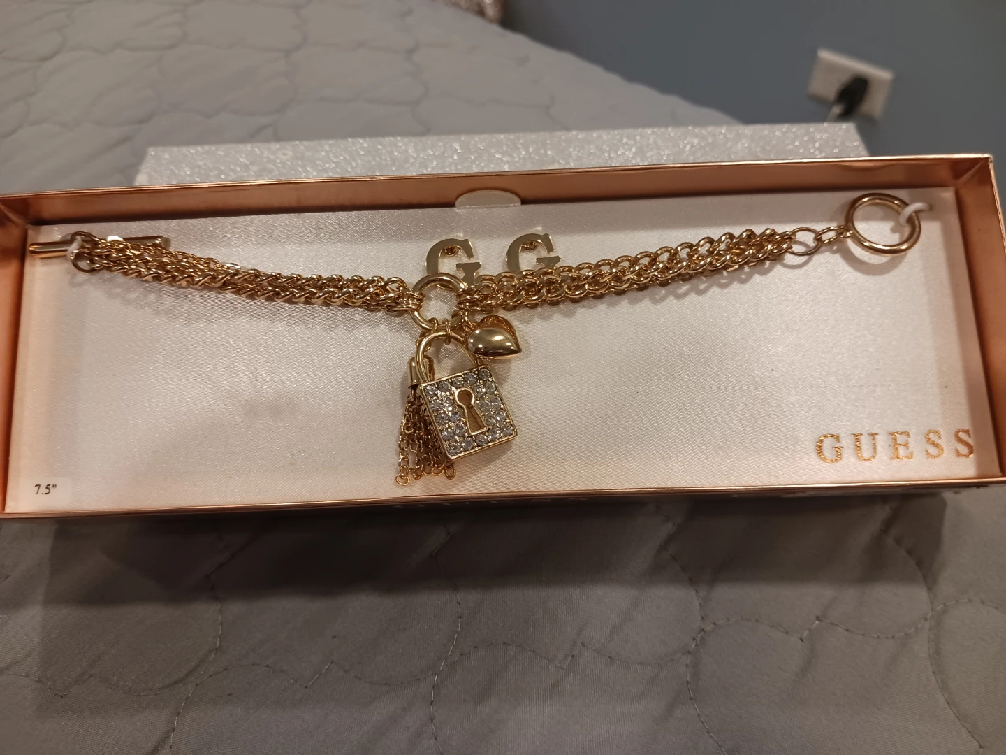 Guess Gold Tone Charm Bracelet