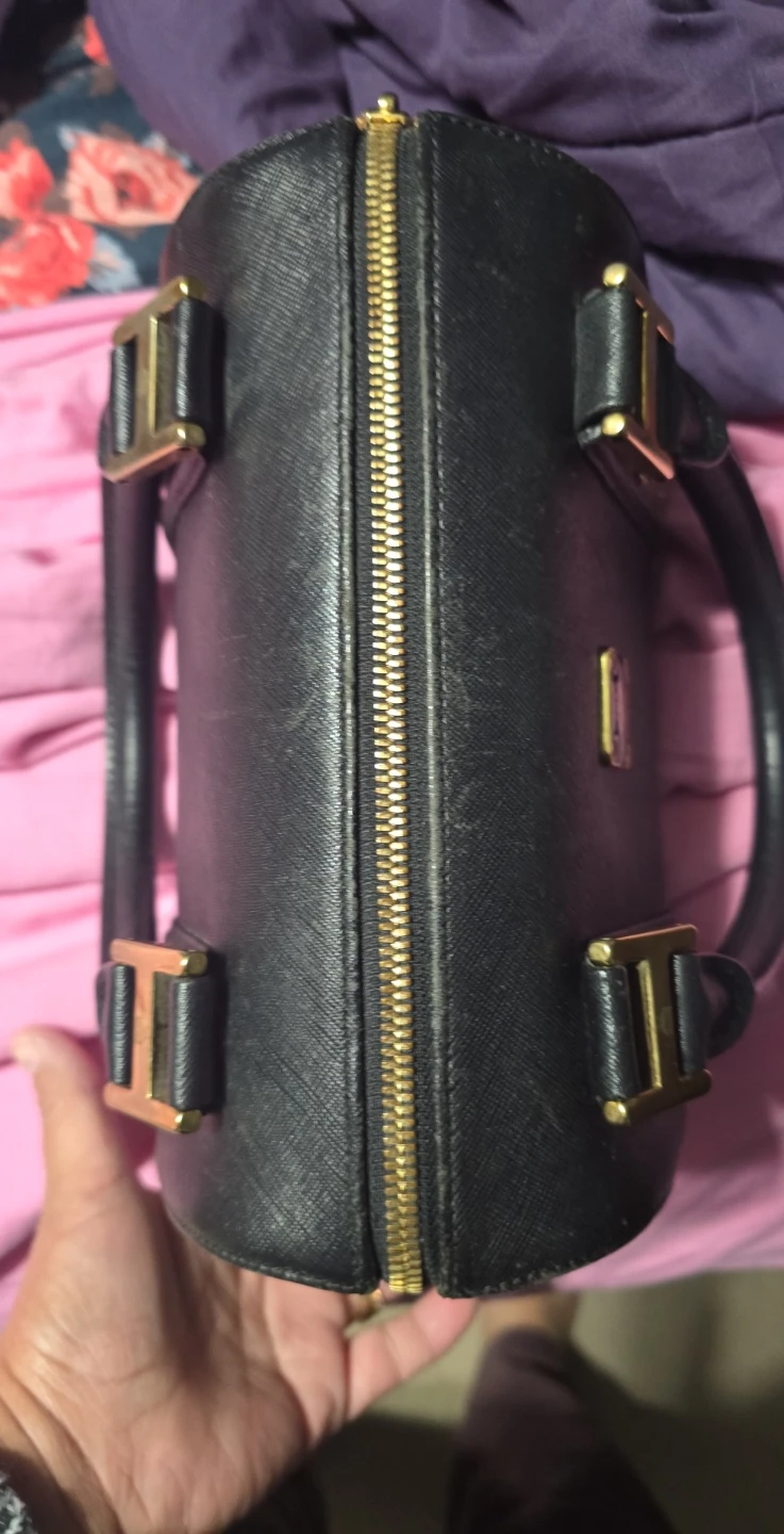 Black MCM barrel handbag