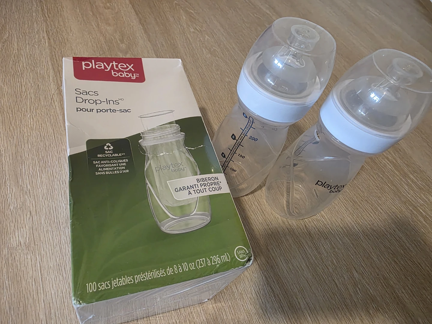 2 Playtex Baby Bottles and 100 Drop-Ins Liners