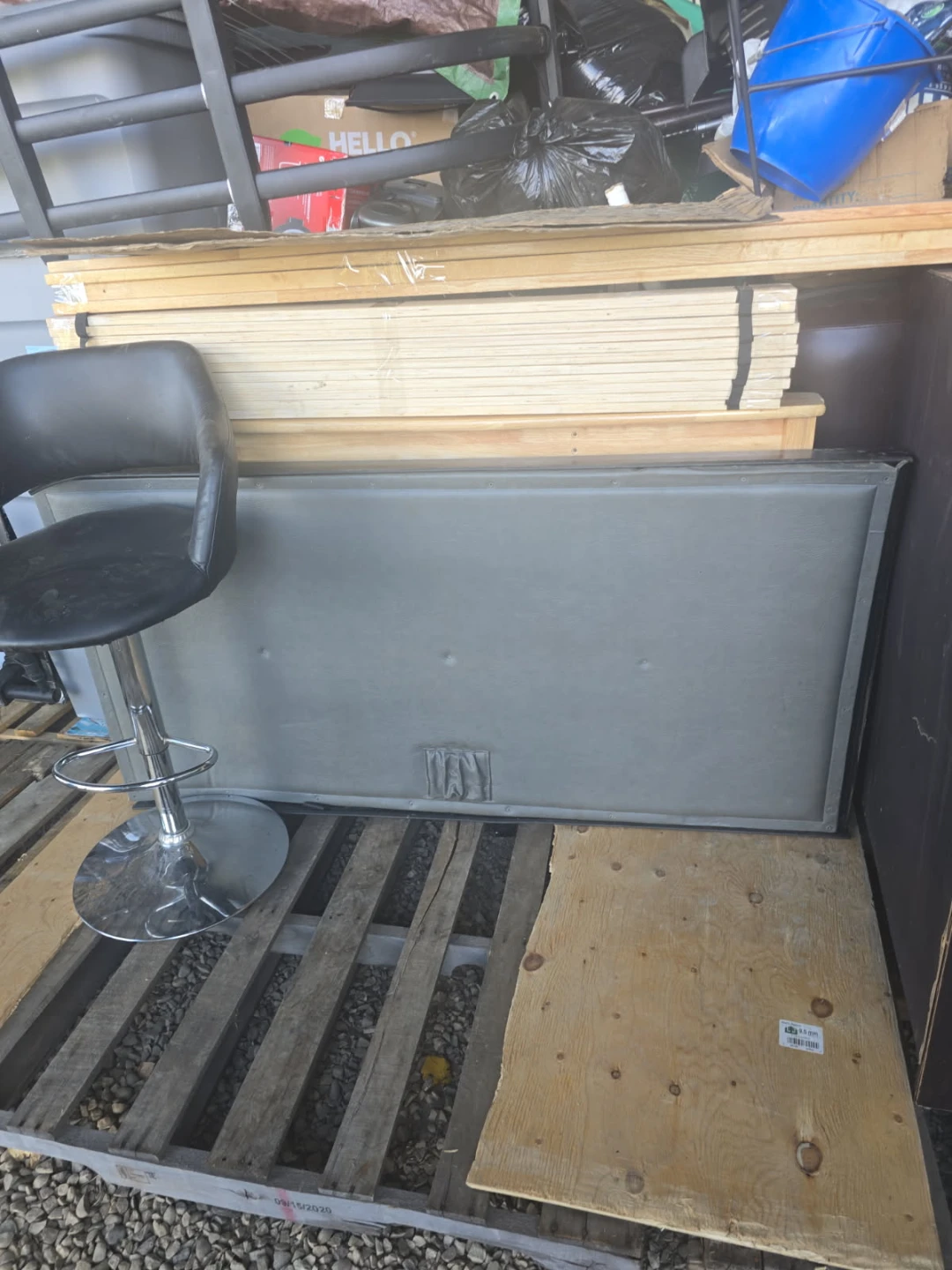 Grey Upholstered  Western Star bed.