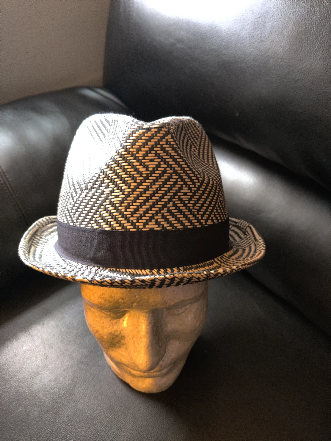 Free hats, one  black felt, one rafia, one paper straw fedora
