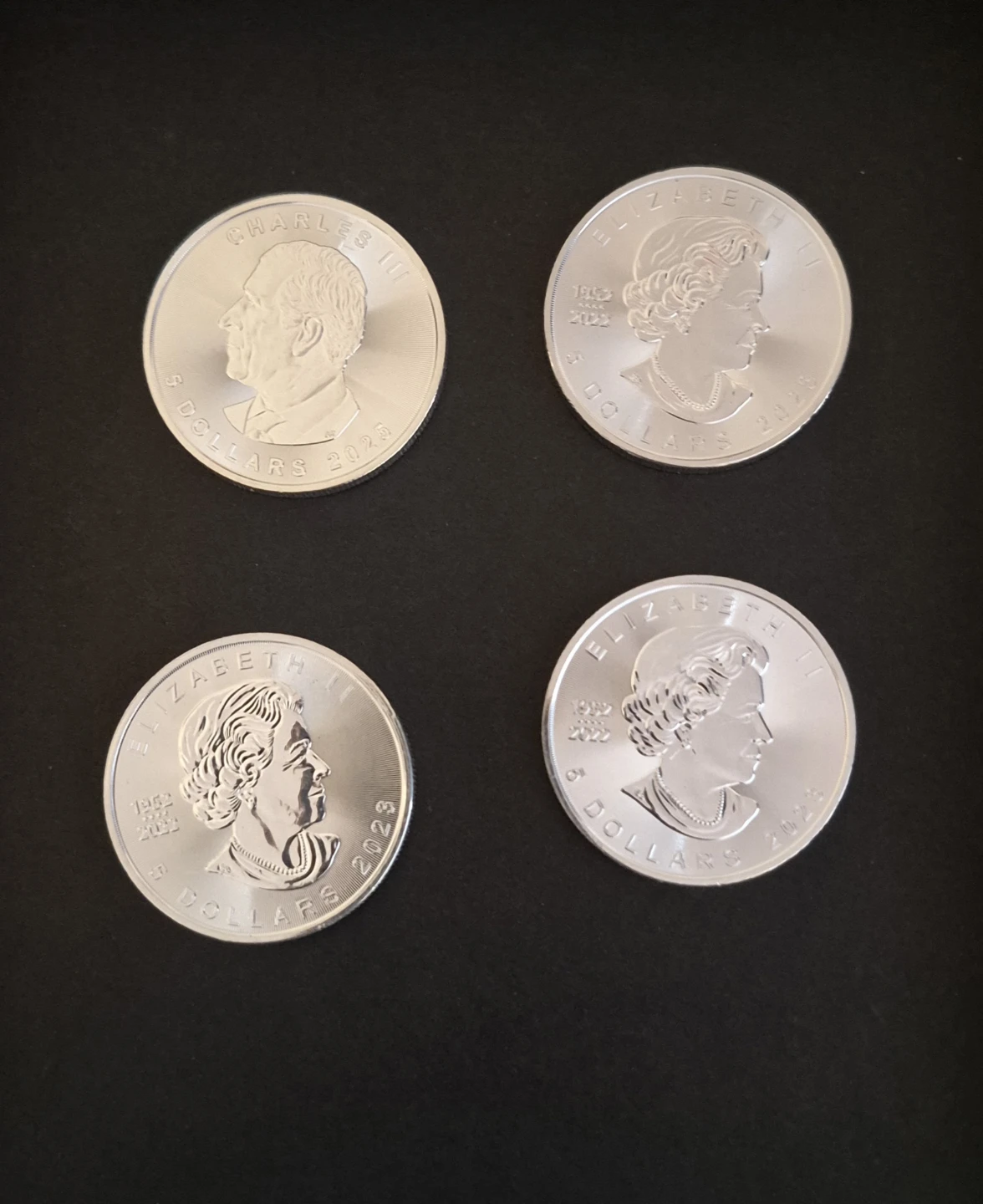 Four 1 oz Canadian Silver Maple Leaf Coins